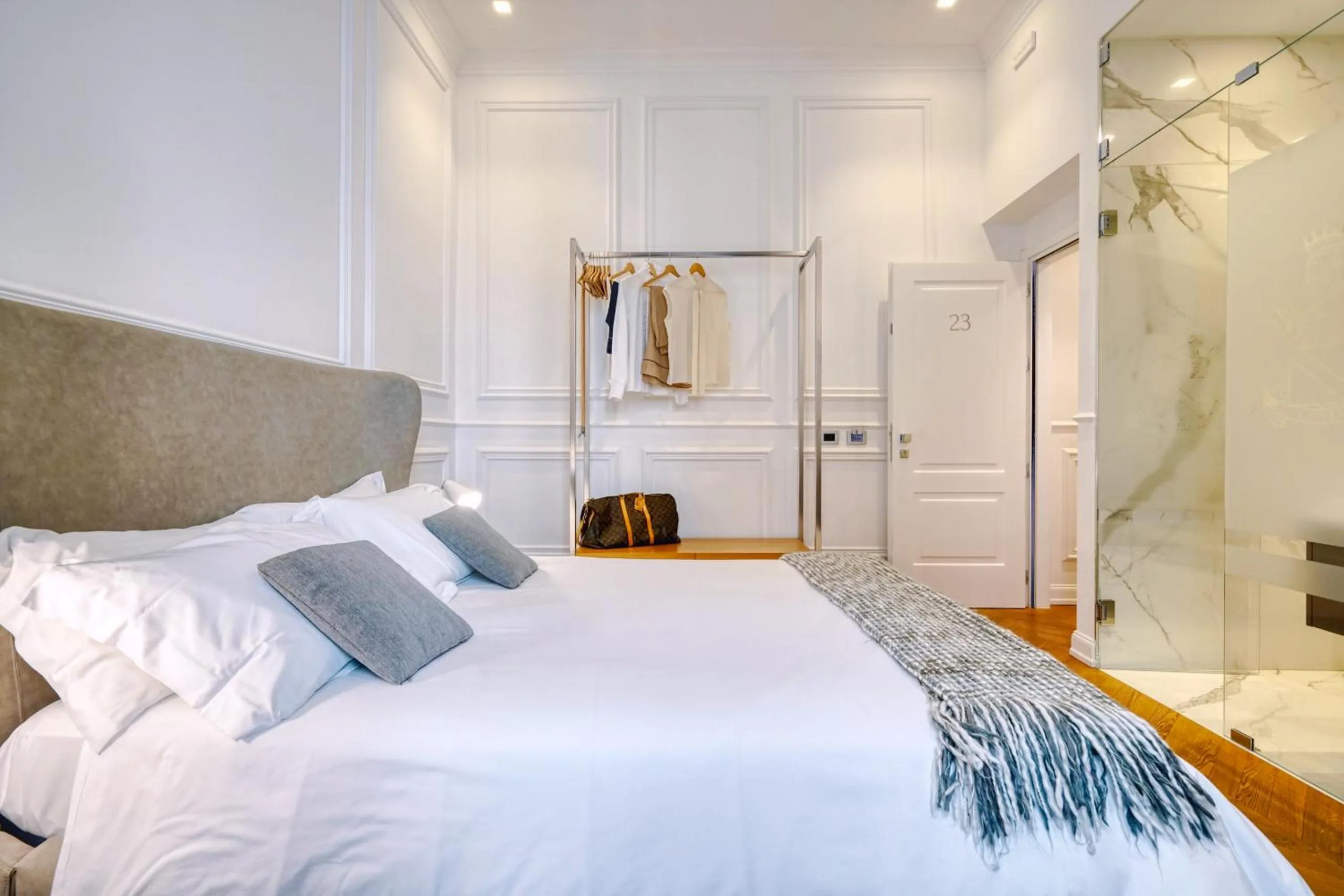 Bed in Via Chiodo Luxury Rooms