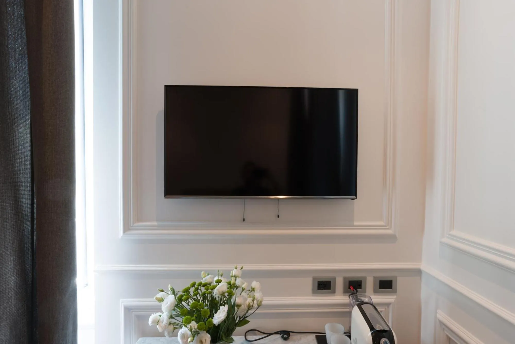 TV and multimedia in Via Chiodo Luxury Rooms