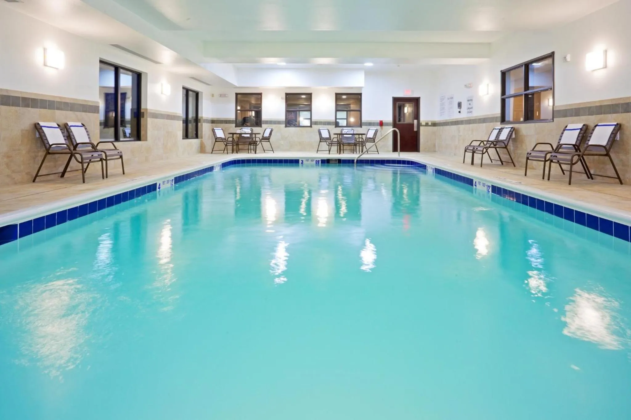 Swimming pool in Holiday Inn Express & Suites Syracuse North - Airport Area by IHG