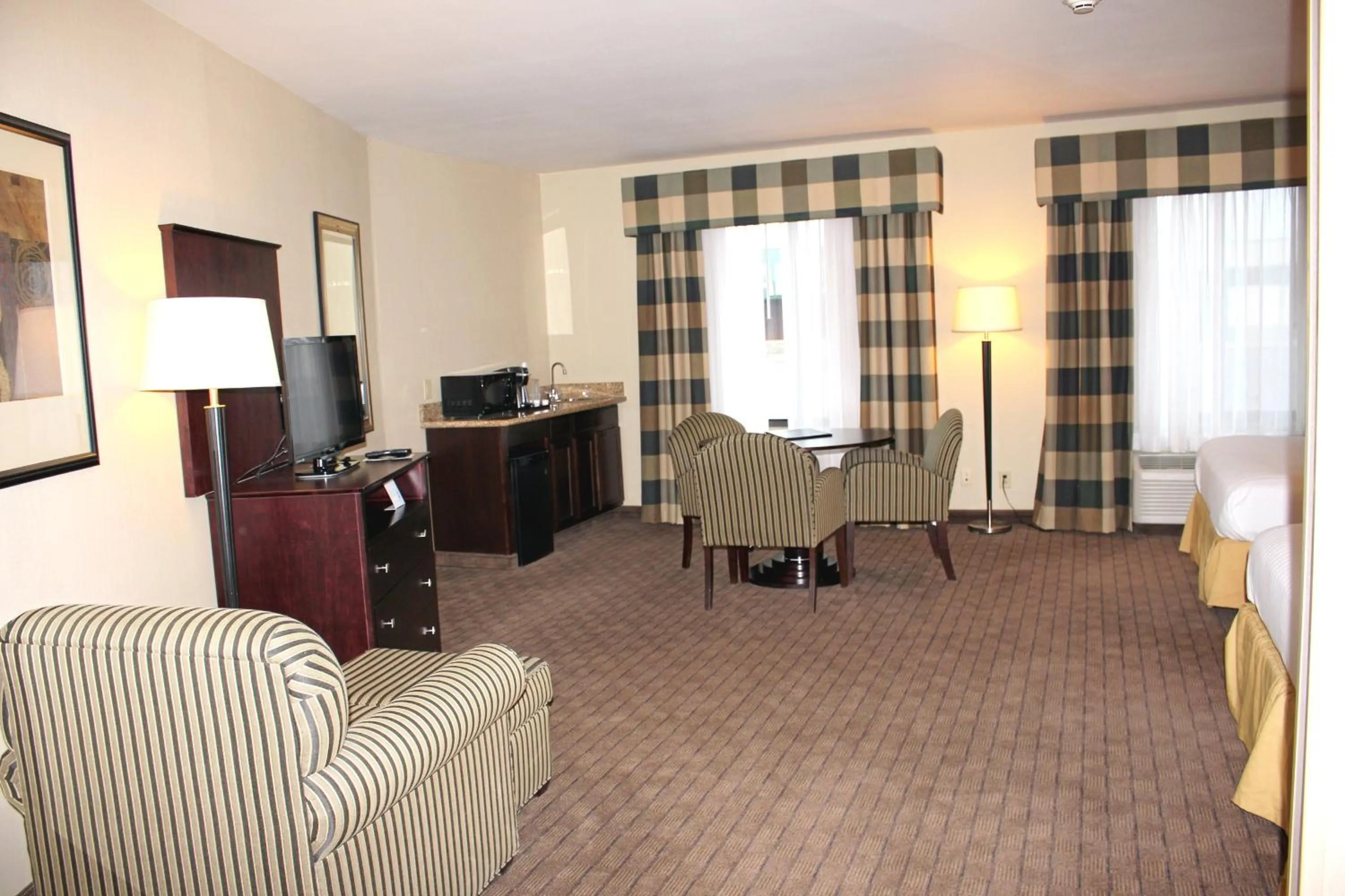 Photo of the whole room in Holiday Inn Express & Suites Syracuse North - Airport Area by IHG