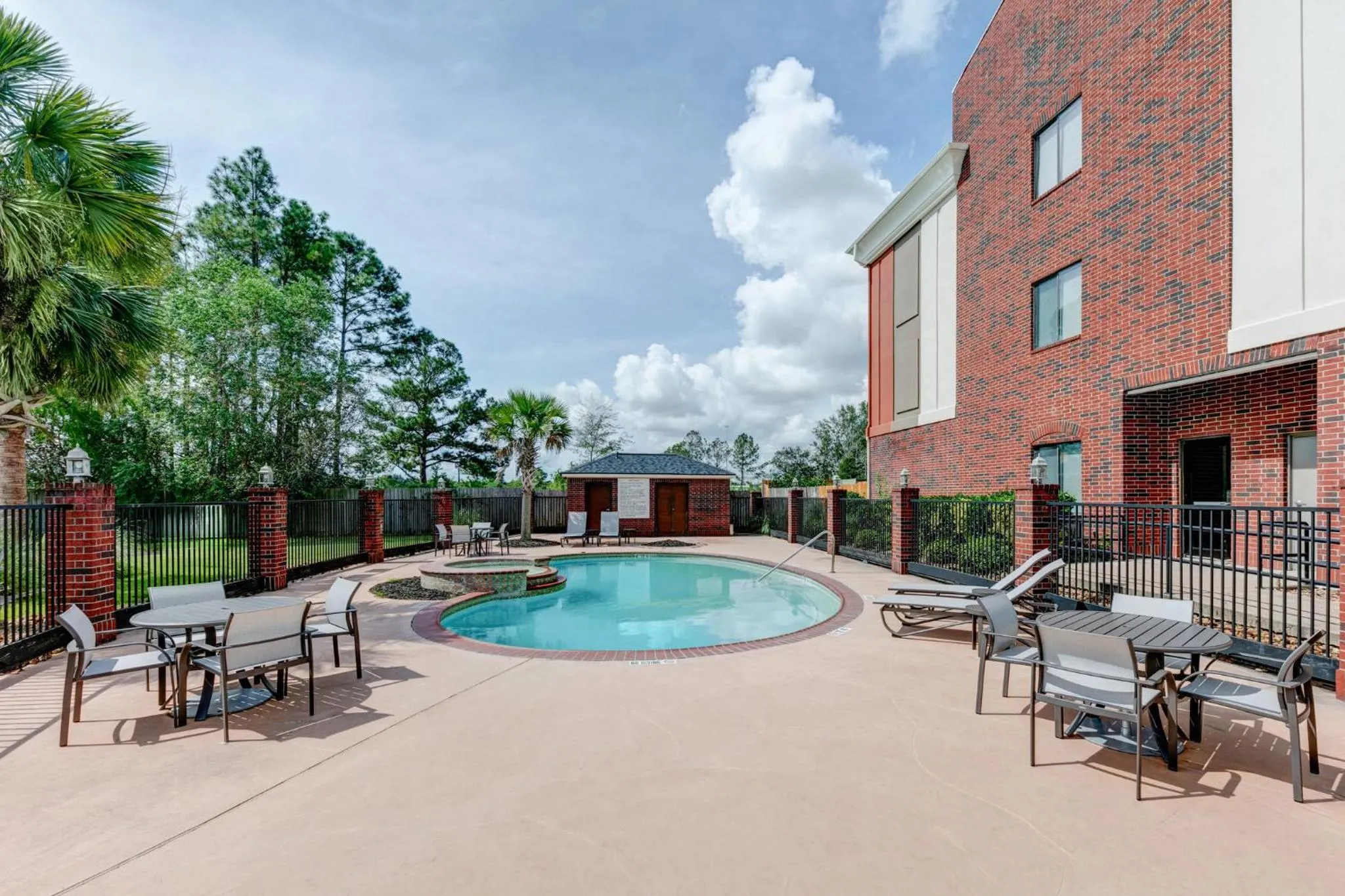 Swimming pool in Holiday Inn Express Hotel & Suites Winnie by IHG