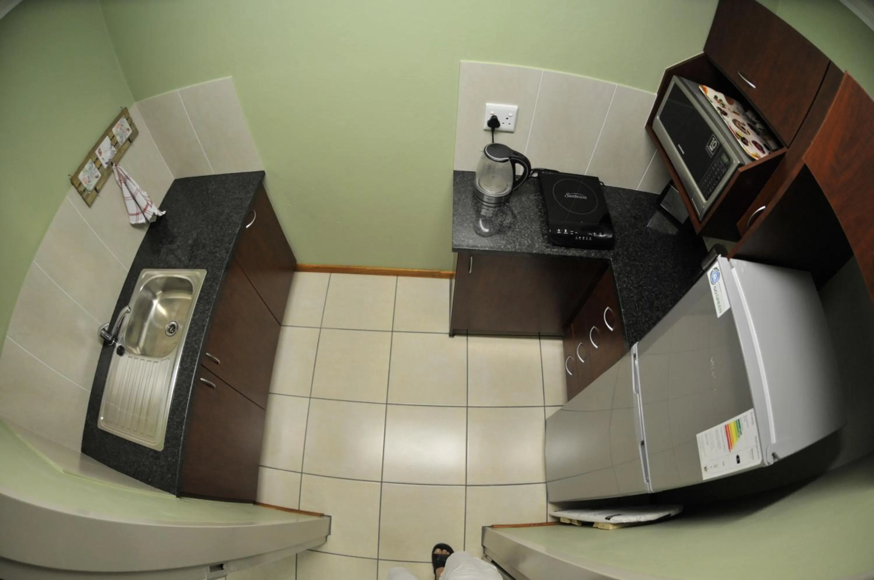 Kitchen or kitchenette in The Flower Box Long Term Accommodation