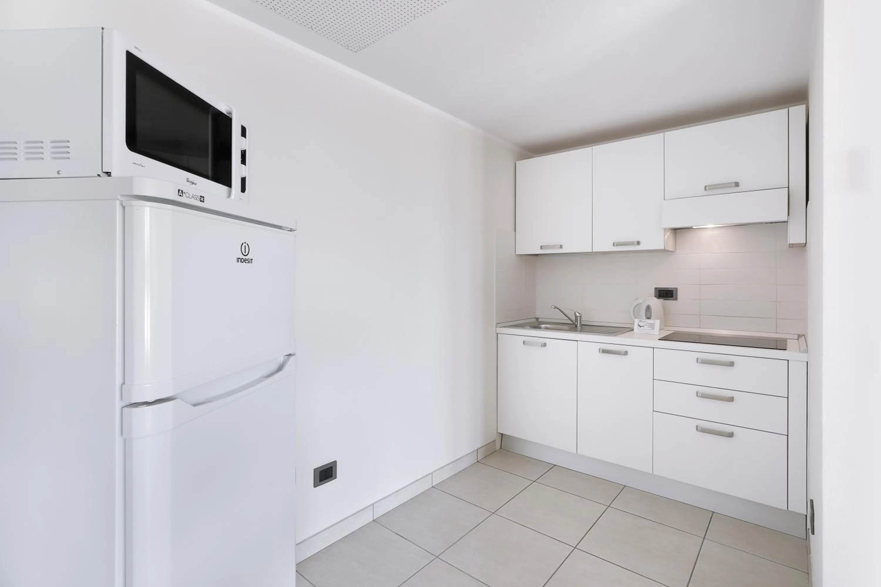 Kitchen or kitchenette in Diano Sporting Apartments