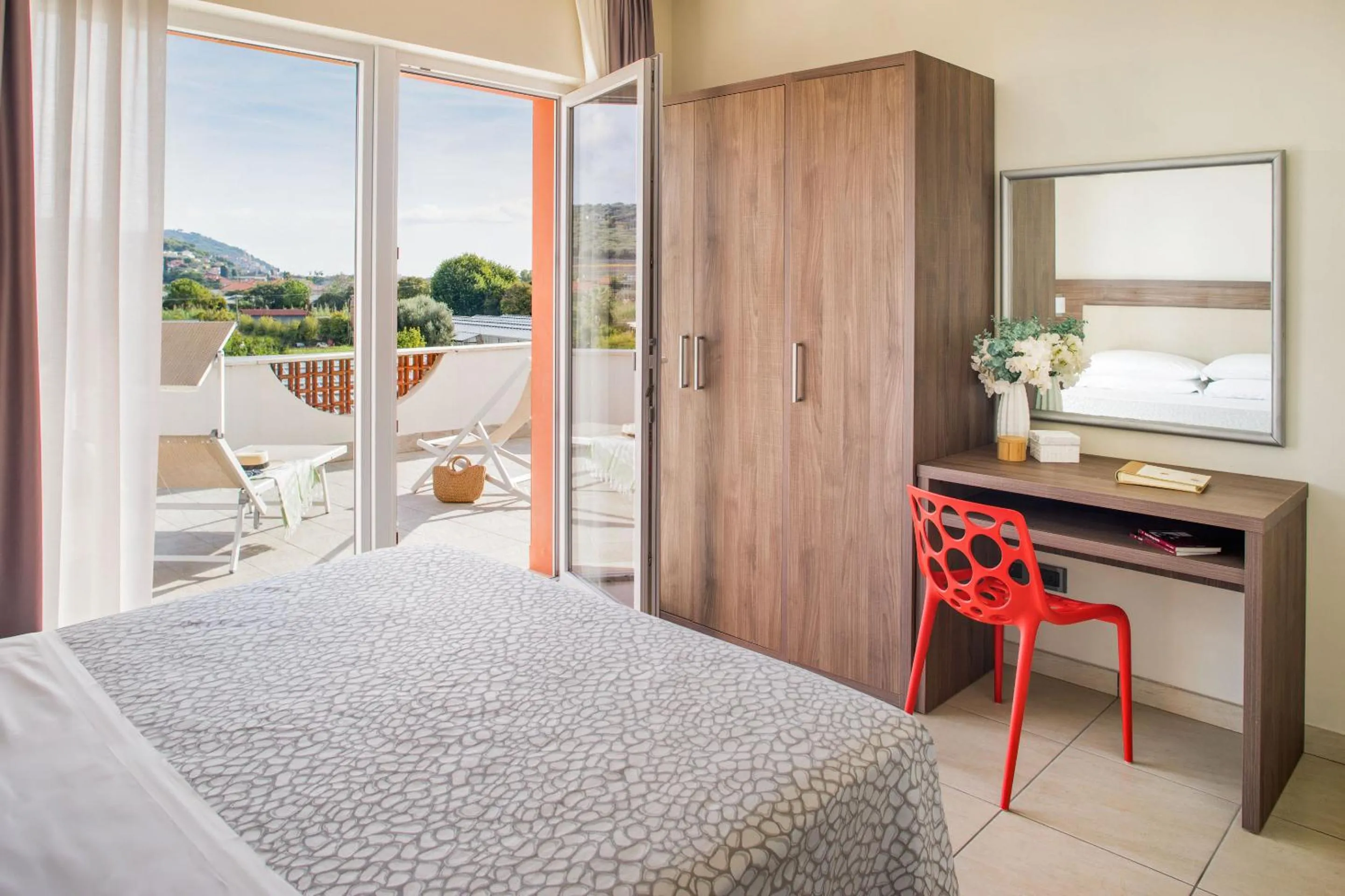 Bed in Diano Sporting Apartments