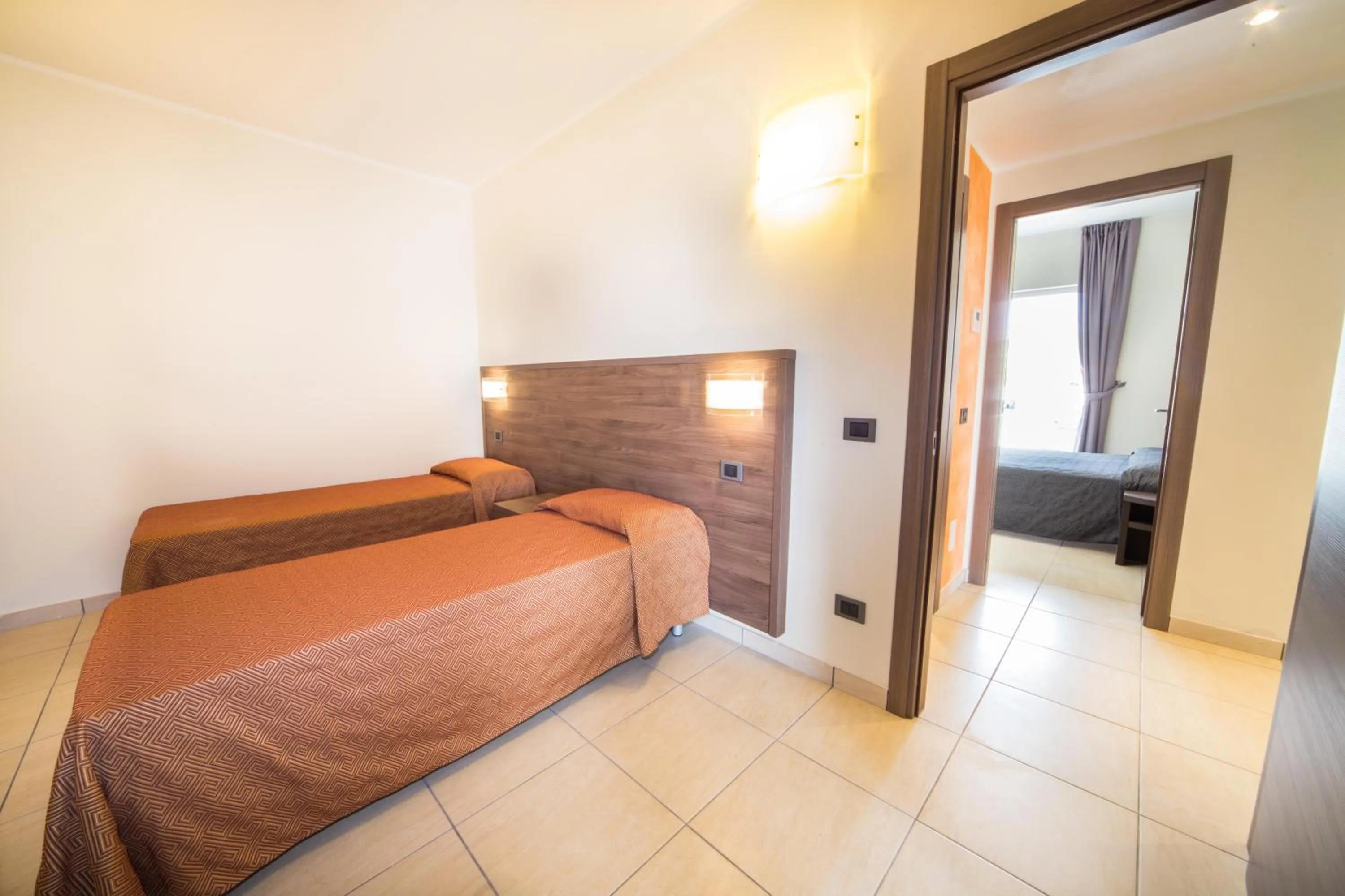 Bedroom, Bed in Diano Sporting Apartments