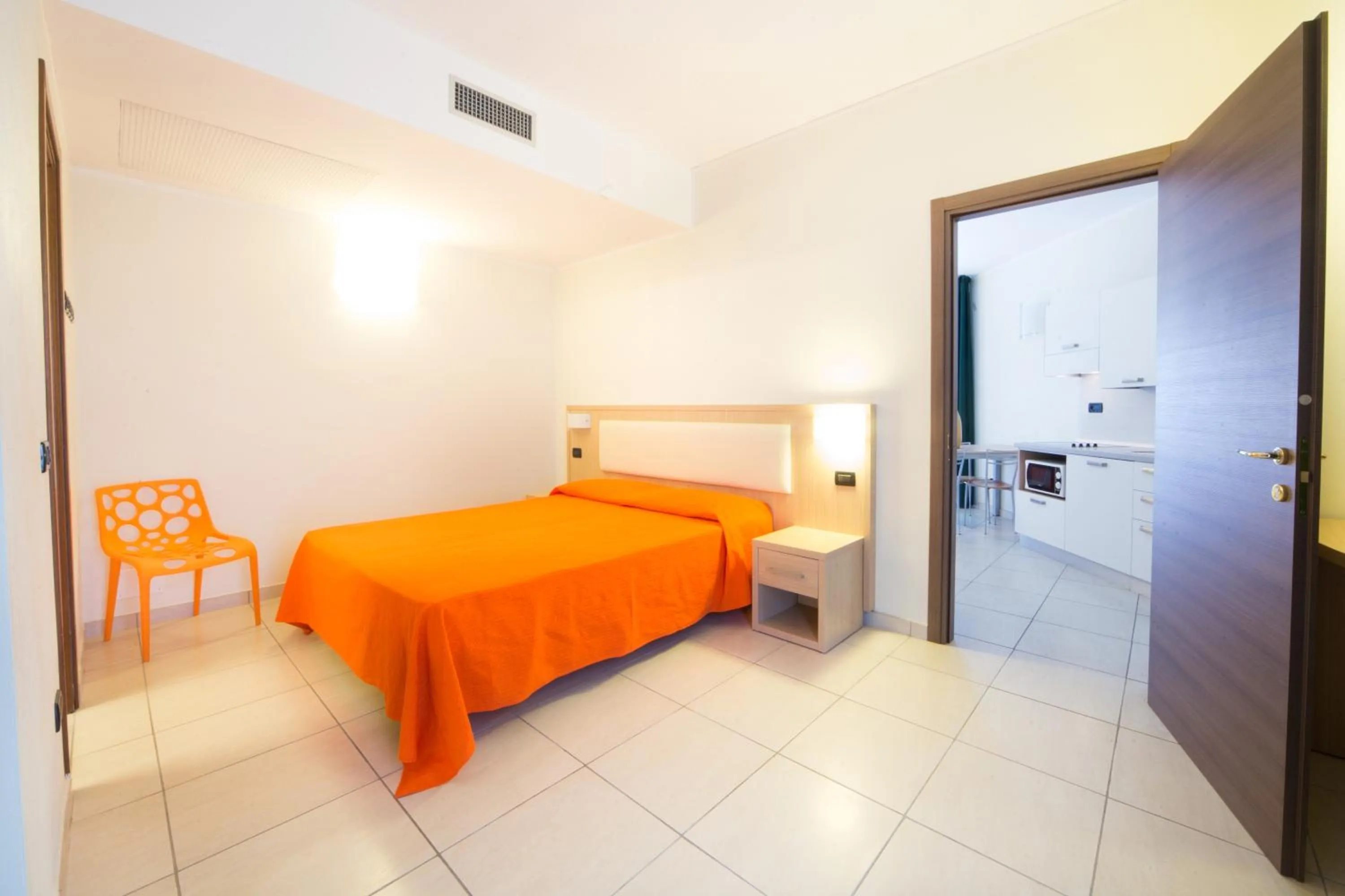 Bed in Diano Sporting Apartments