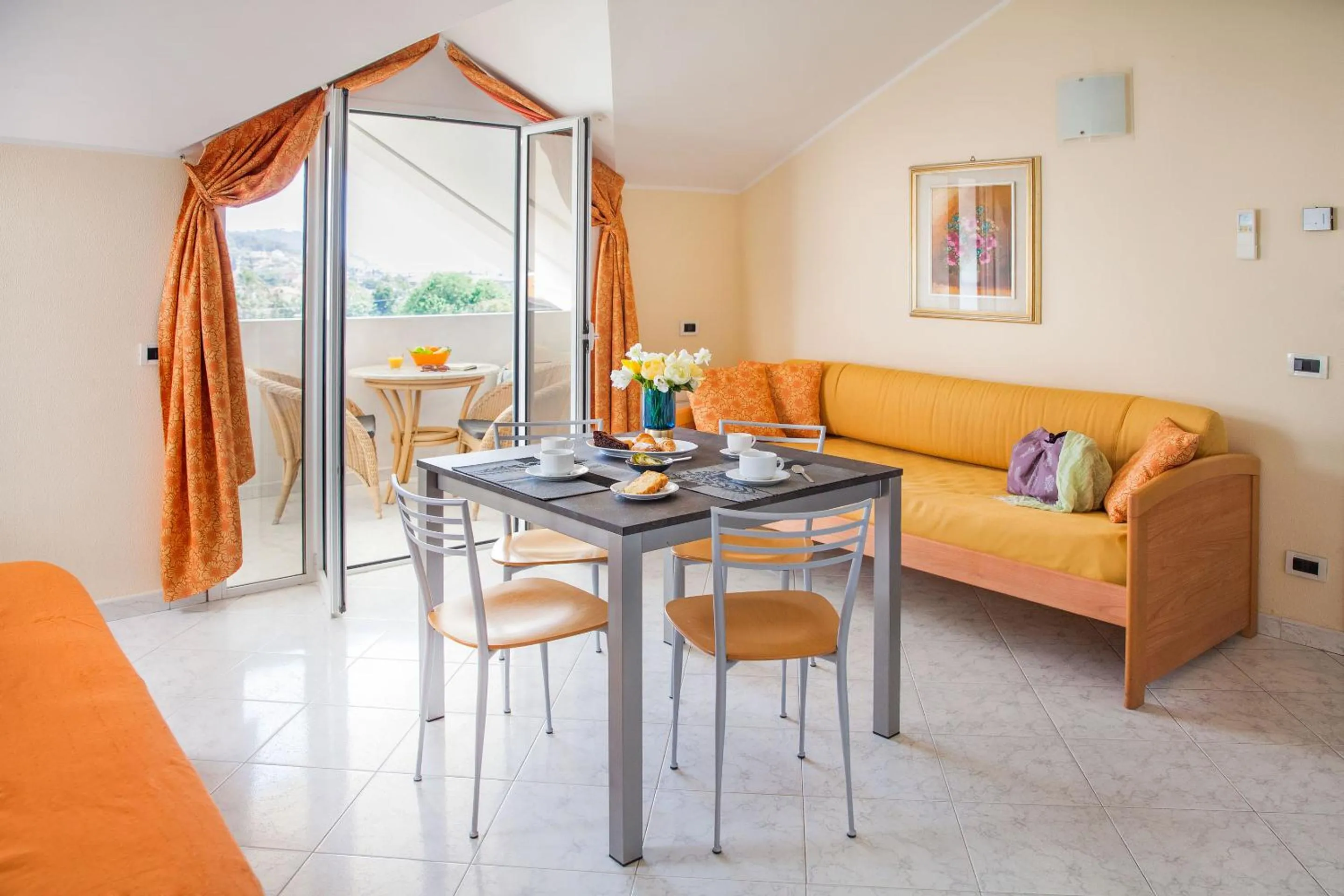 Living room in Diano Sporting Apartments