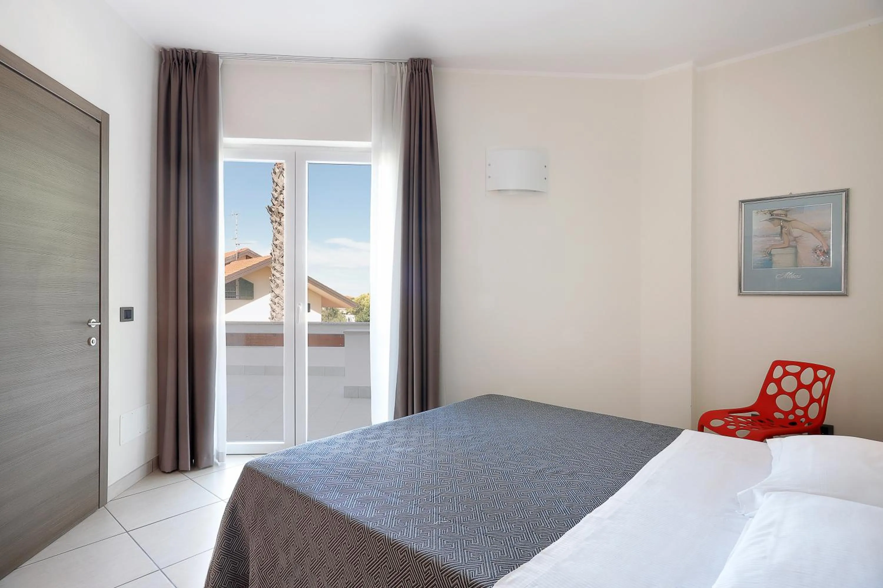 Bed in Diano Sporting Apartments