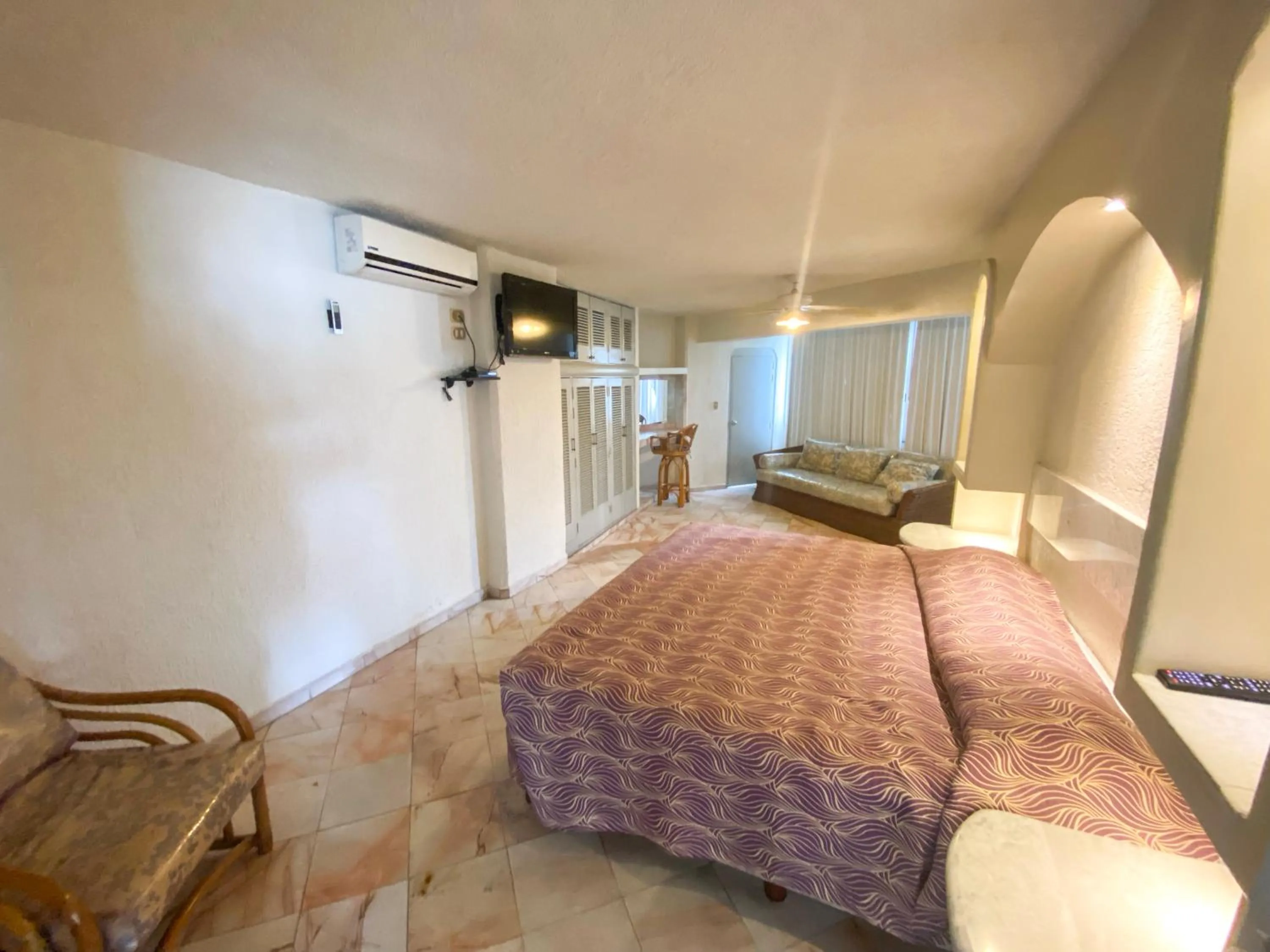 Bed in Hotel Suites Jazmín Acapulco