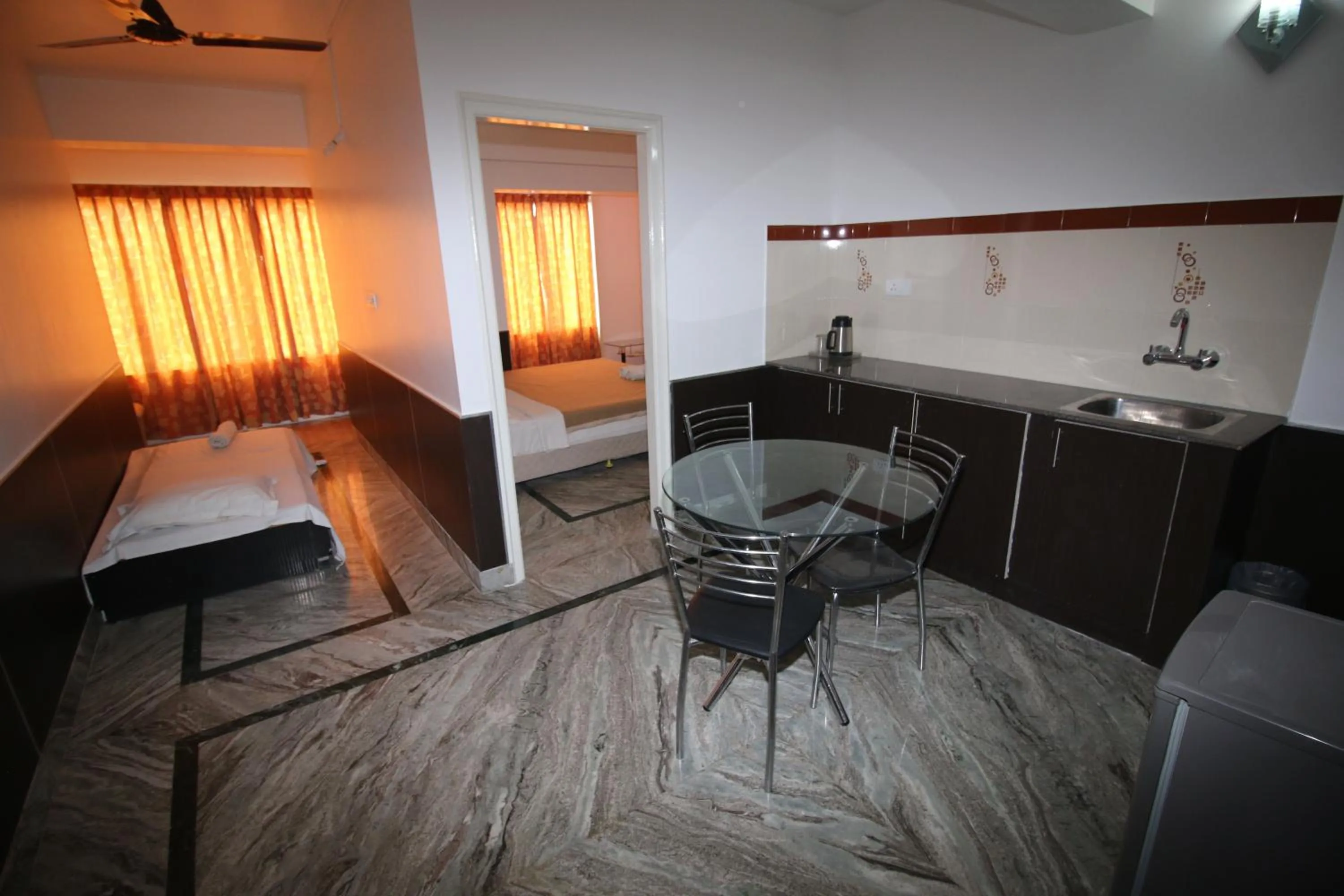 Kitchen or kitchenette, Bed in Sai Pavilion