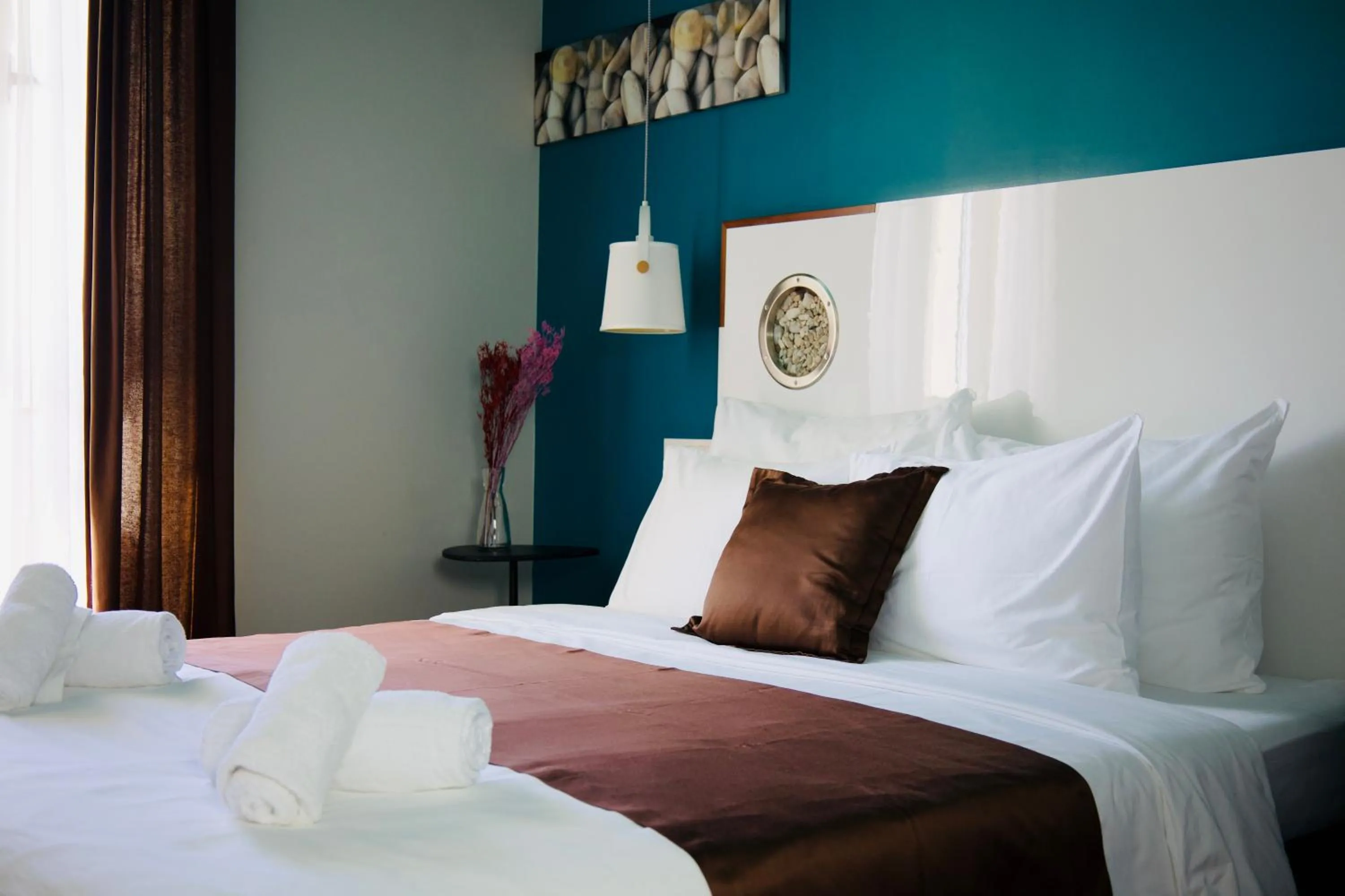 Bed in Hvar Riva Rooms