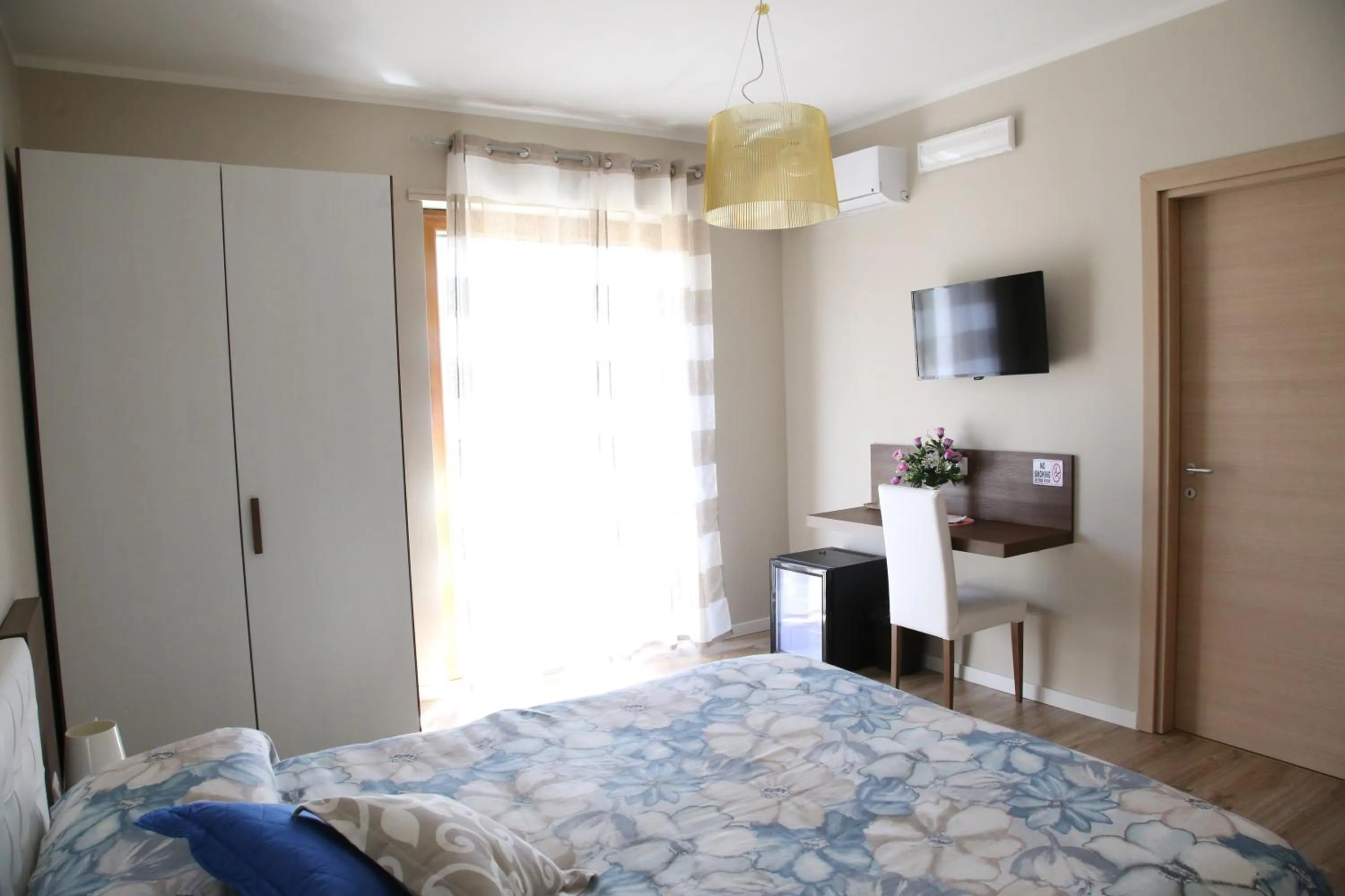 Bed in Sorrento Coast Suites B&B