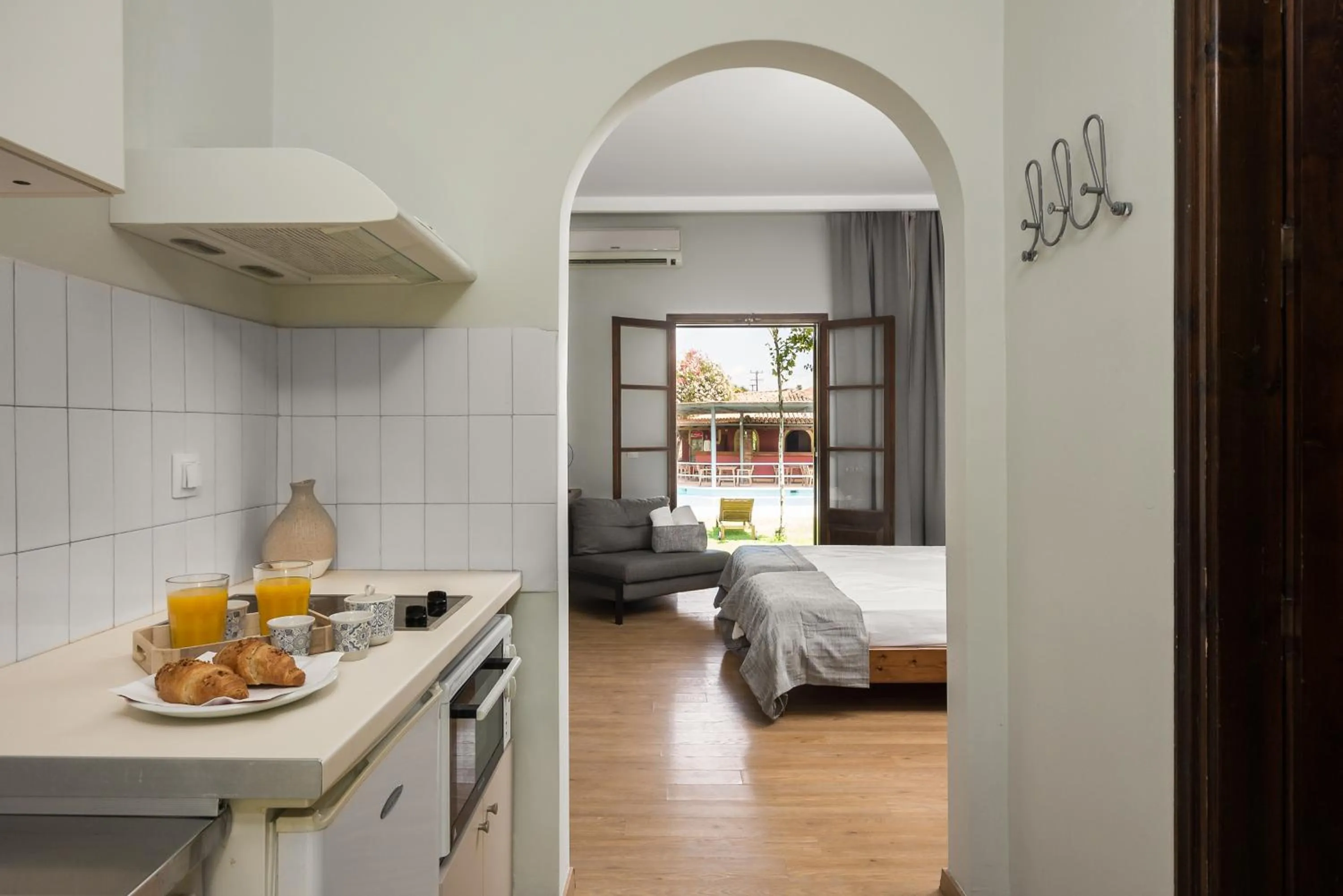 Kitchen or kitchenette, Bed in Folies Corfu Town Hotel Apartments