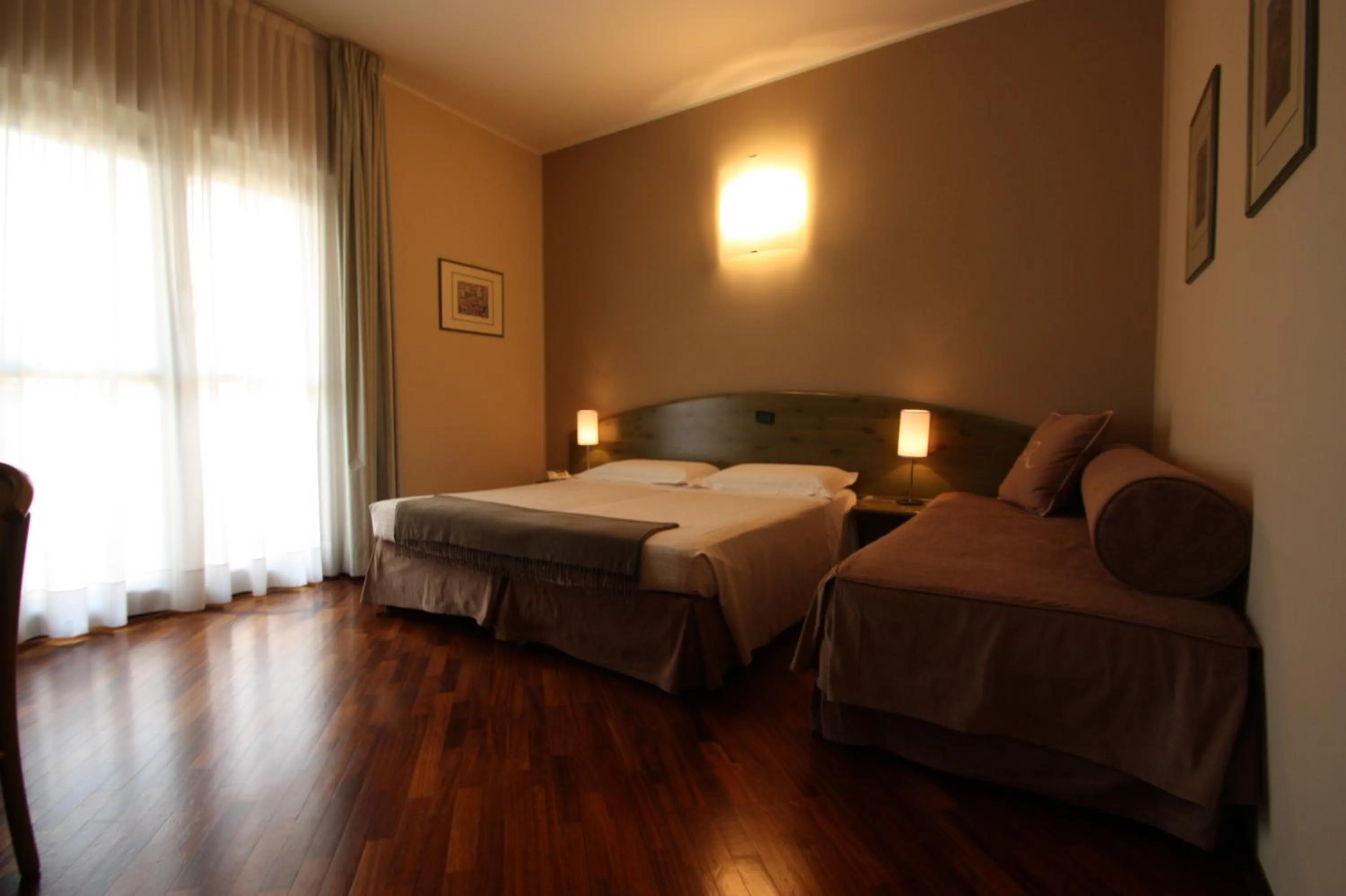Photo of the whole room, Bed in Albergo Della Roccia