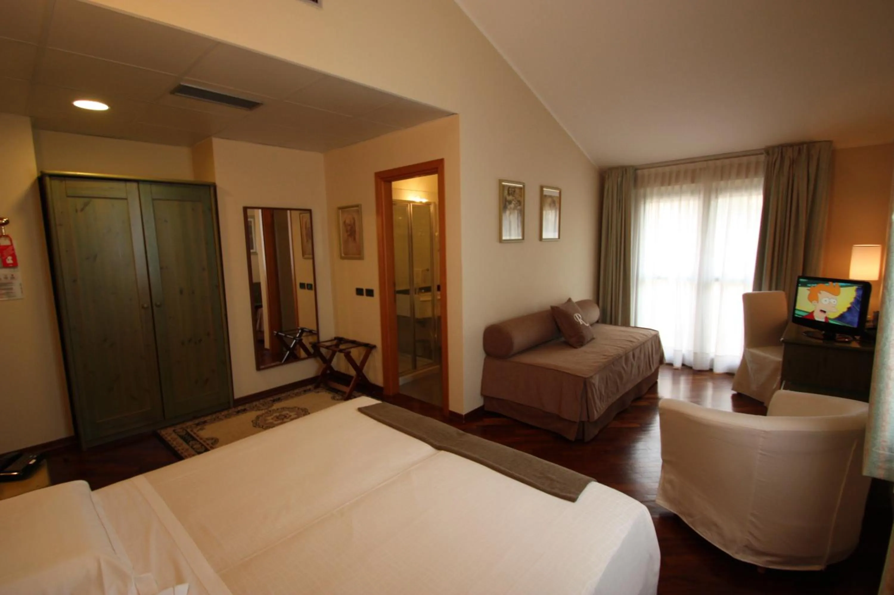 Photo of the whole room, Bed in Albergo Della Roccia