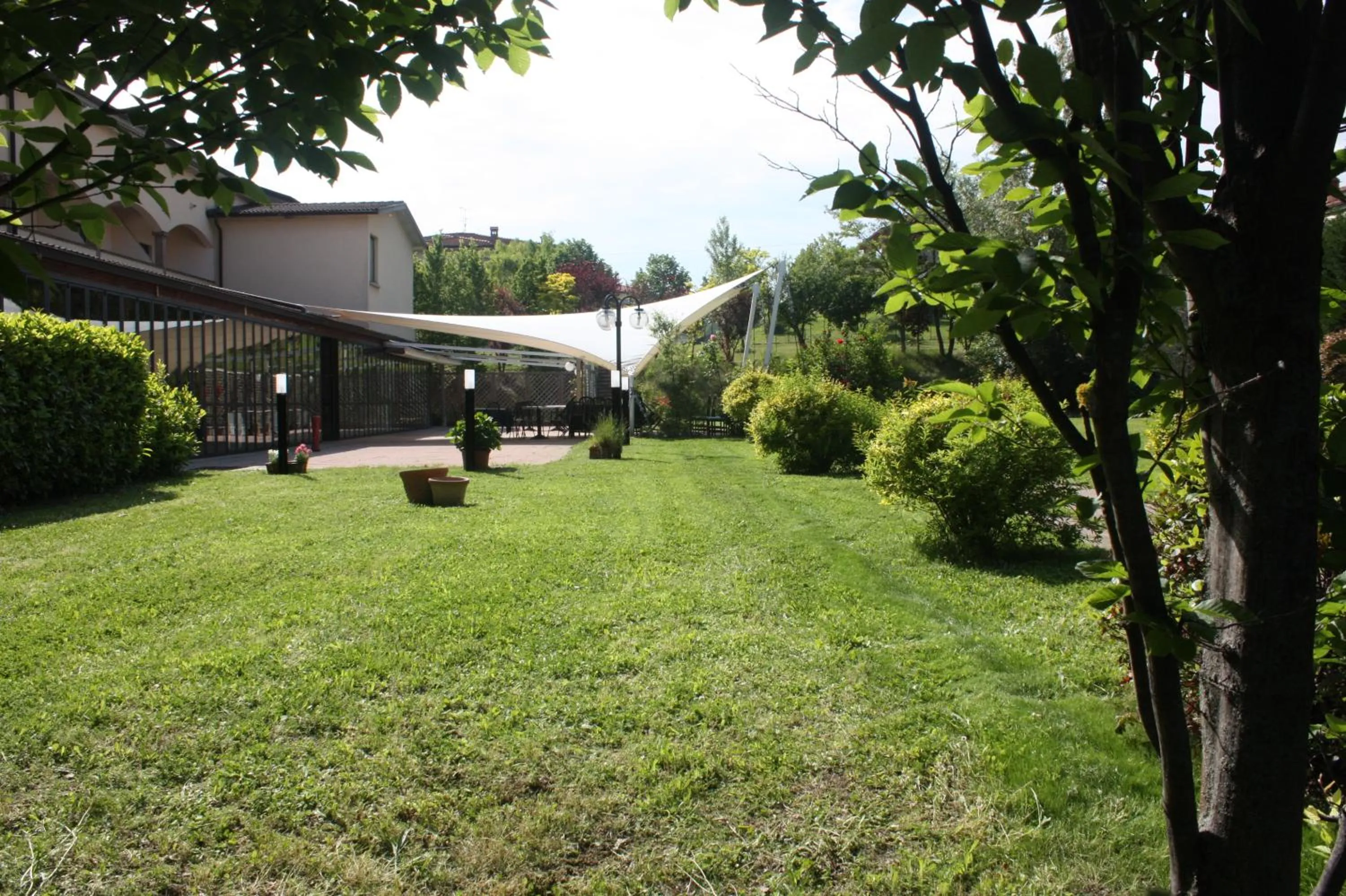 Garden view in Albergo Della Roccia