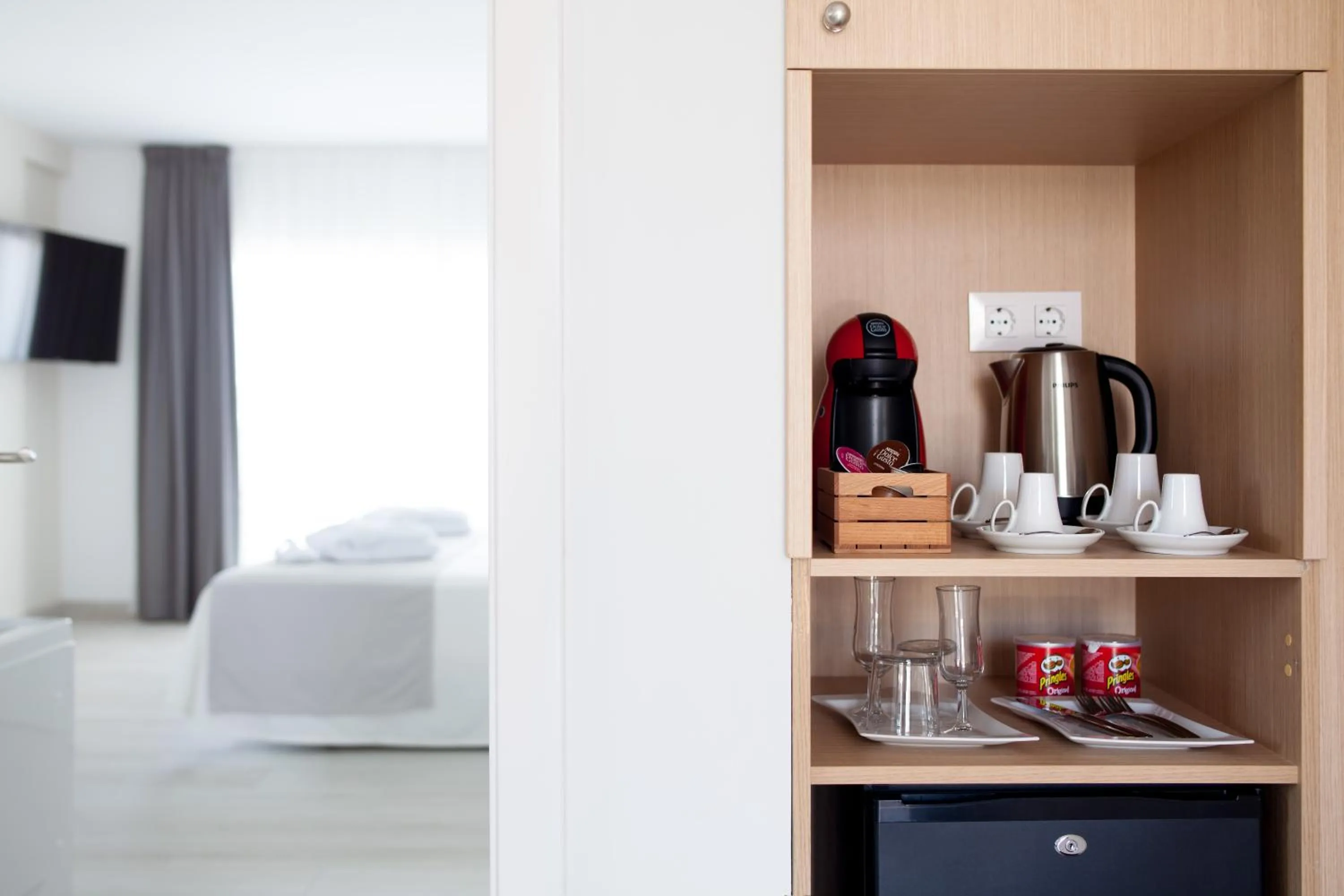 Bed in Playaolid Suites & Apartments