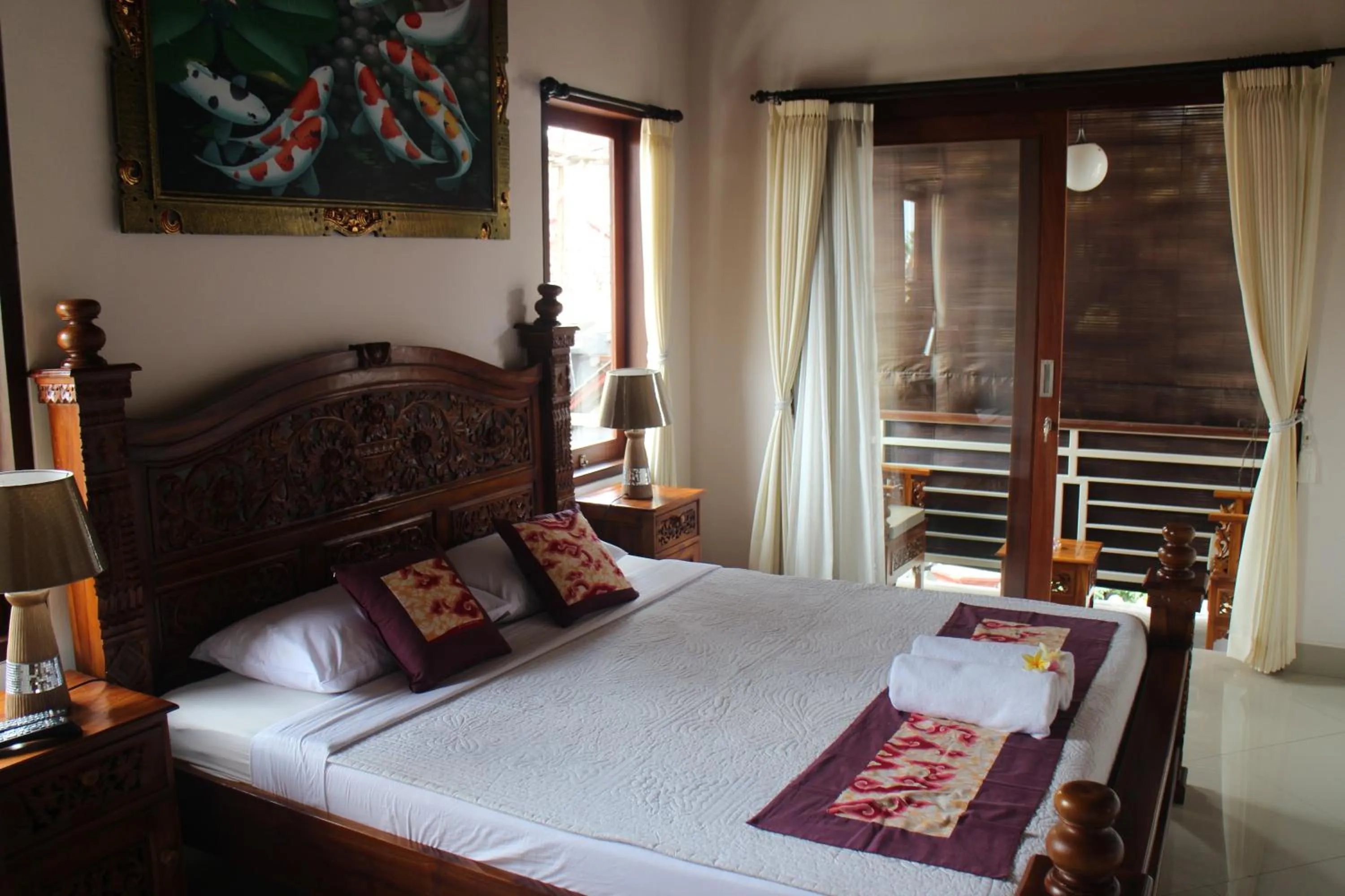 Bed in Betutu Bali Villas