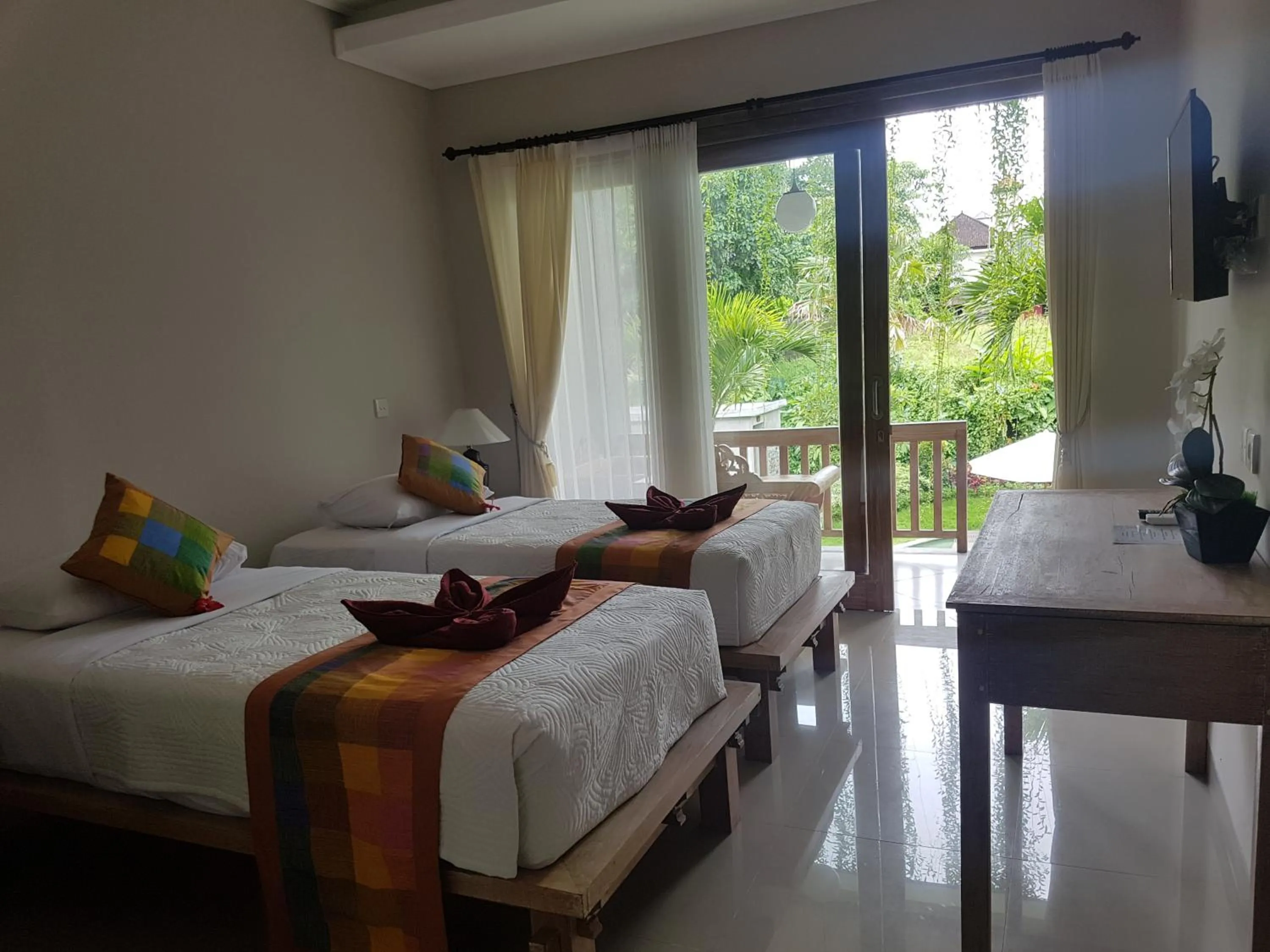 Bed in Betutu Bali Villas