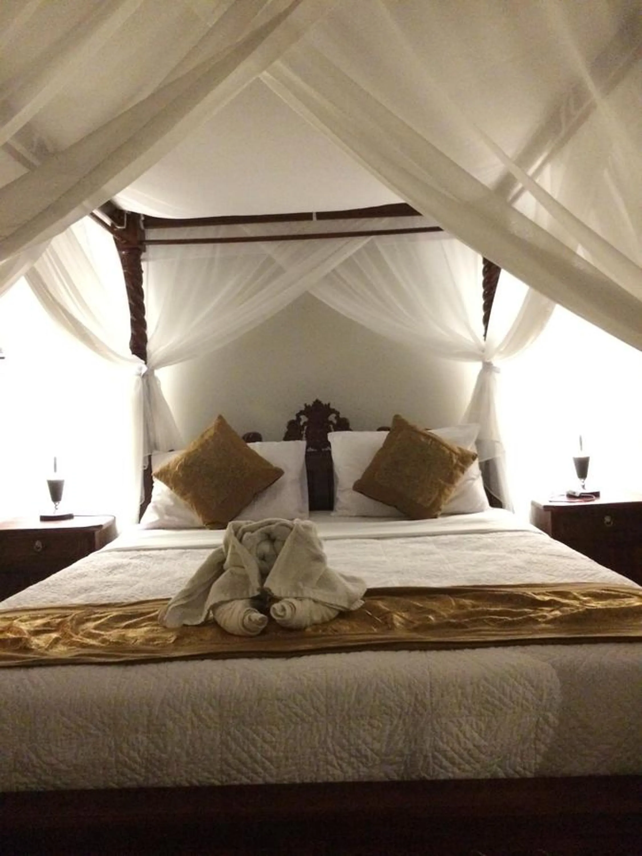 Bed in Betutu Bali Villas