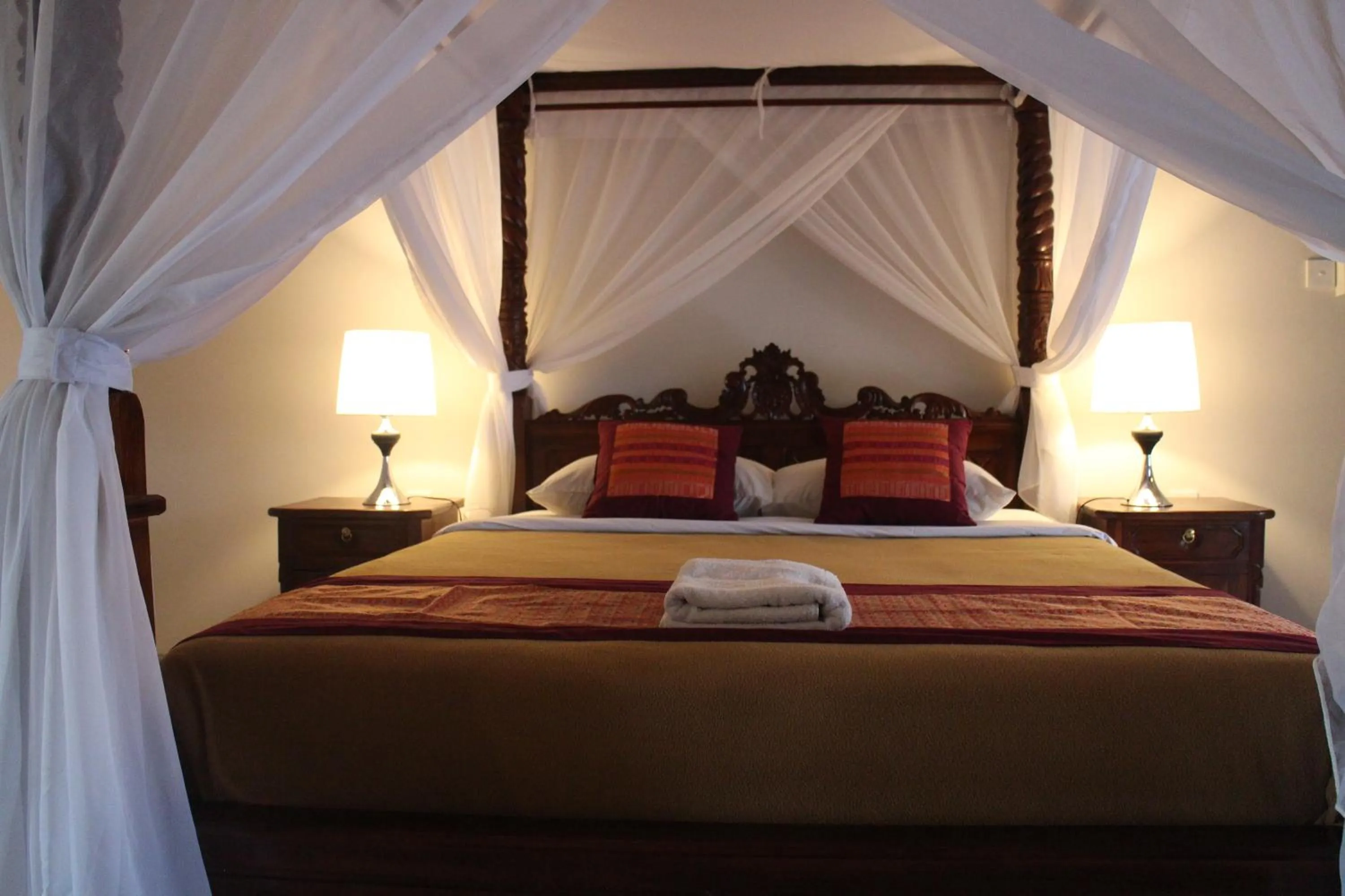 Bed in Betutu Bali Villas