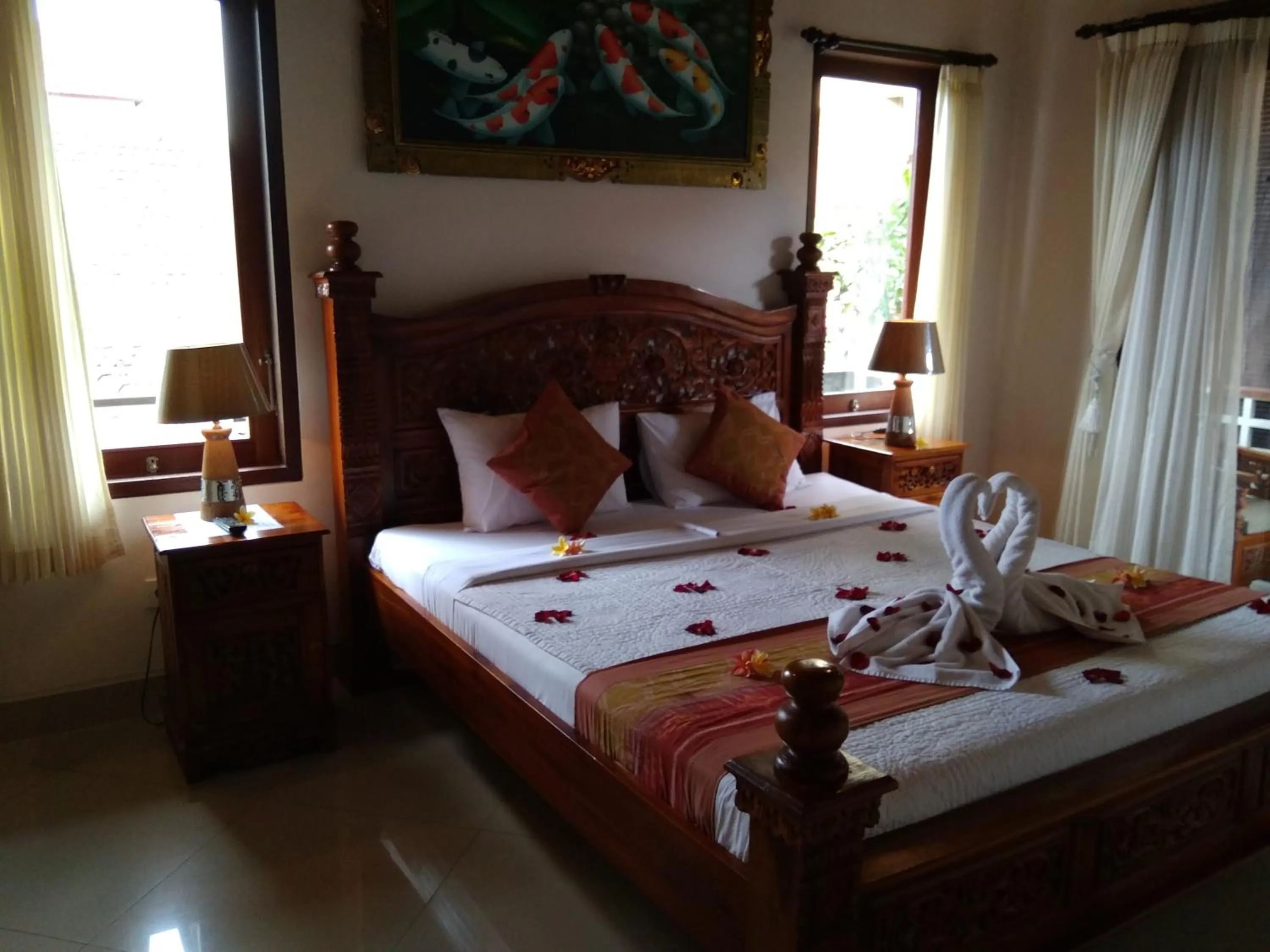 Bed in Betutu Bali Villas