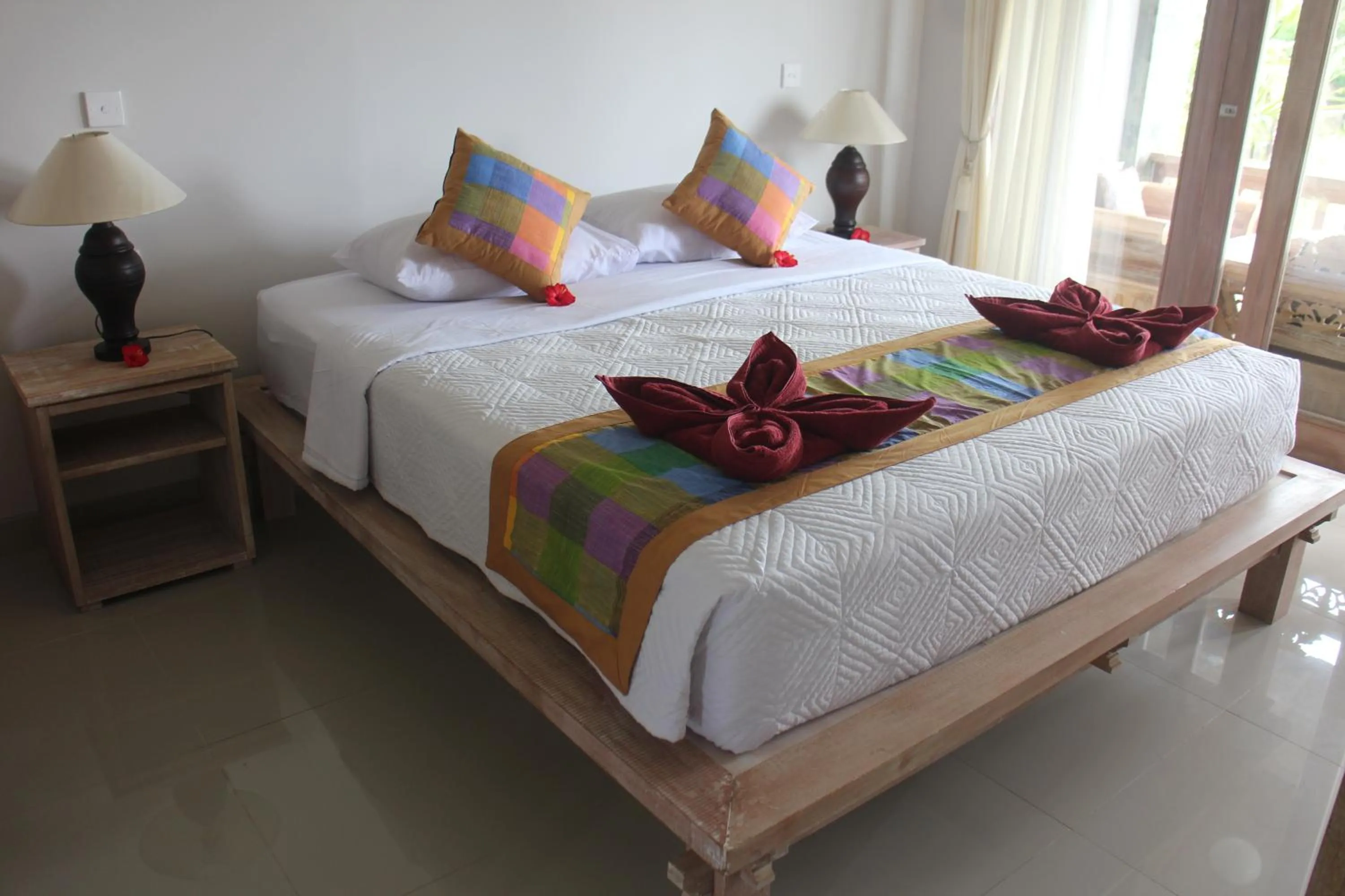 Bed in Betutu Bali Villas