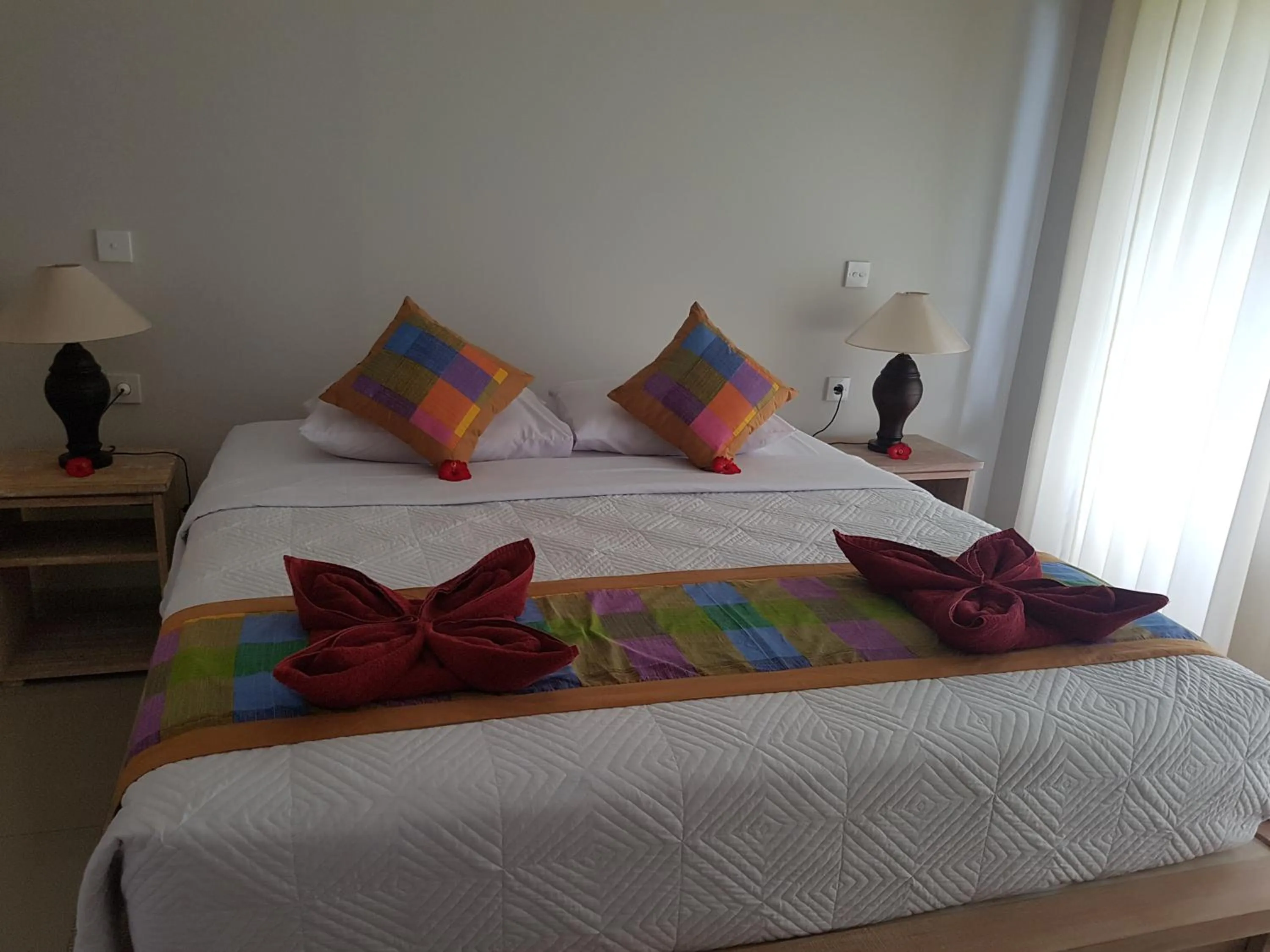 Bed in Betutu Bali Villas