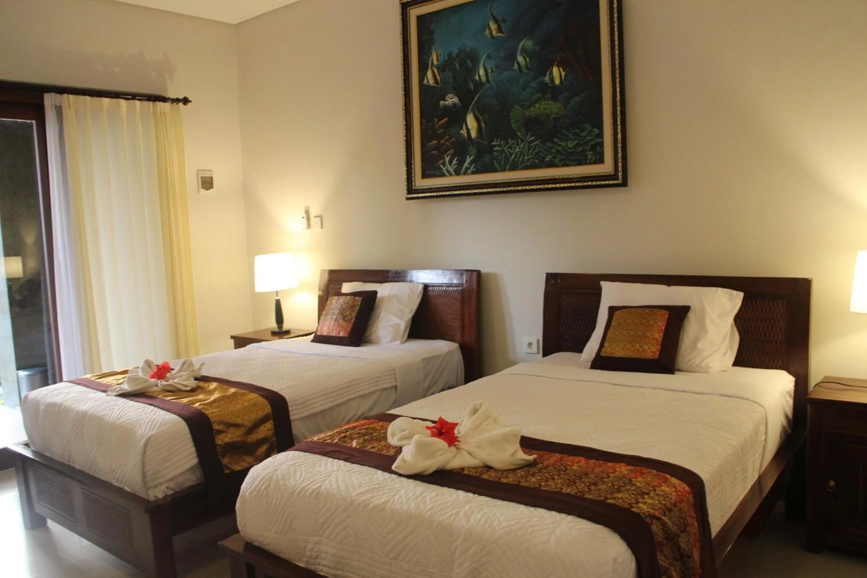 Bed in Betutu Bali Villas