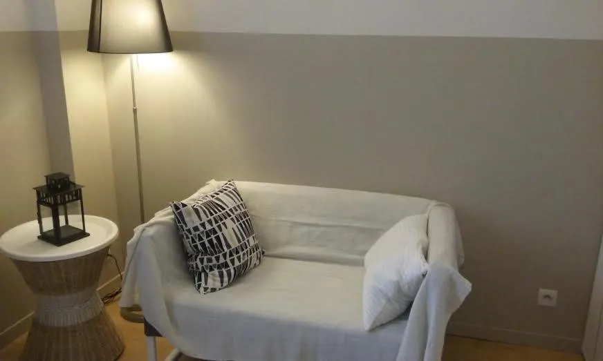 Seating area, Bed in Residences De Chartres