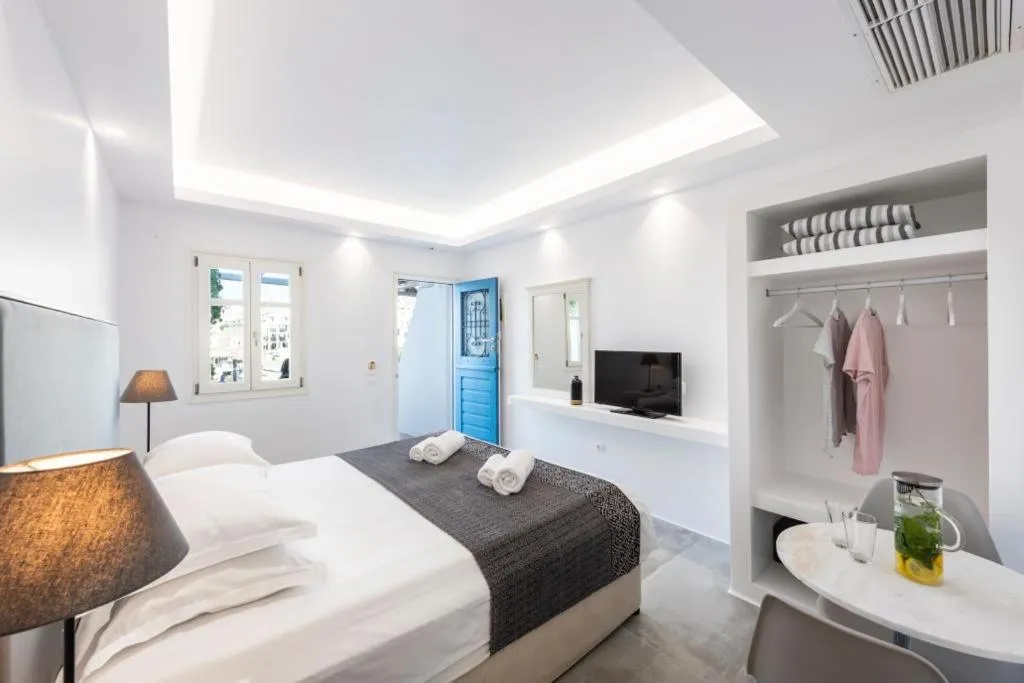 Bed in Alexandros Apartments