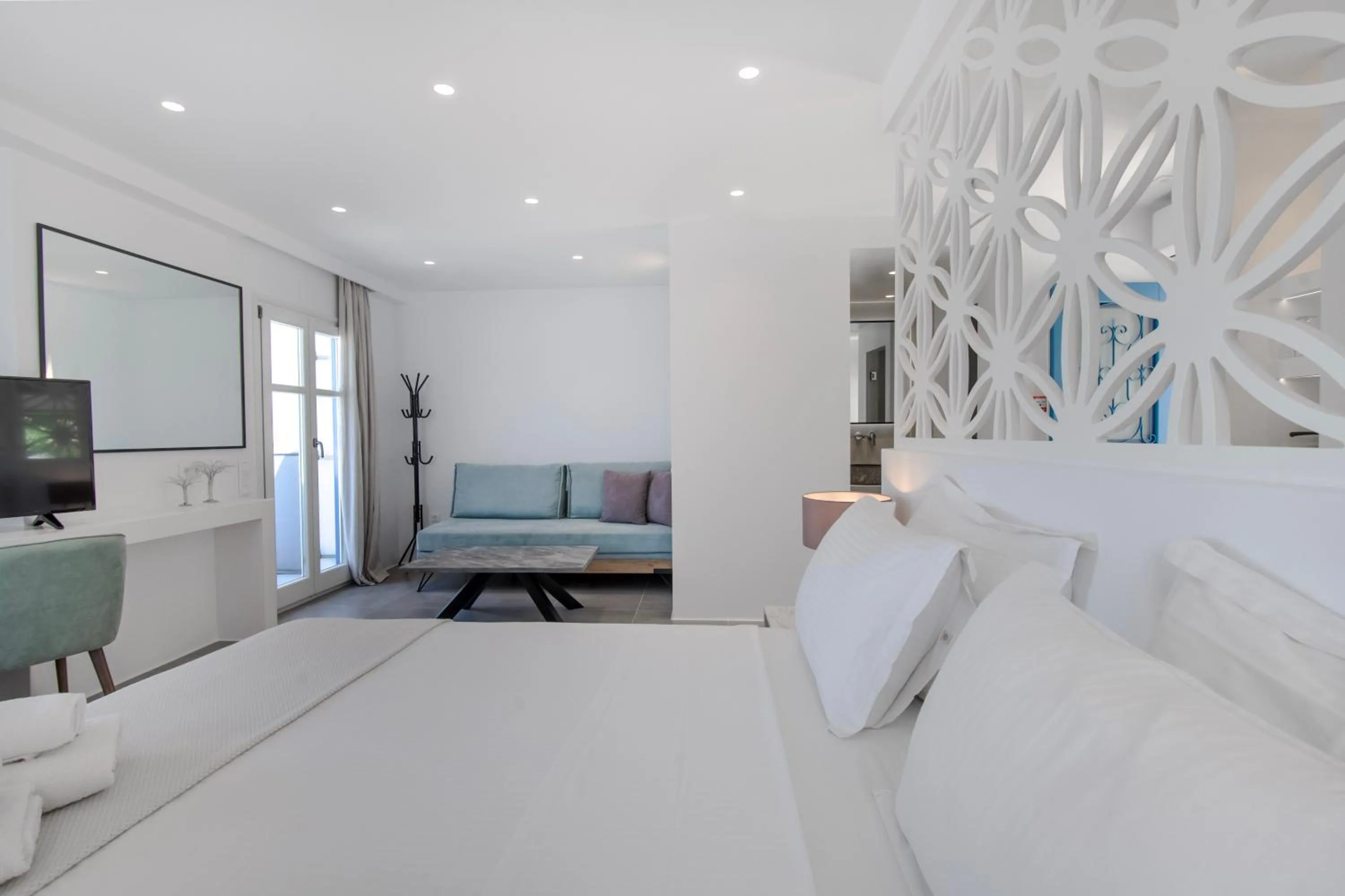 Bed in Alexandros Apartments