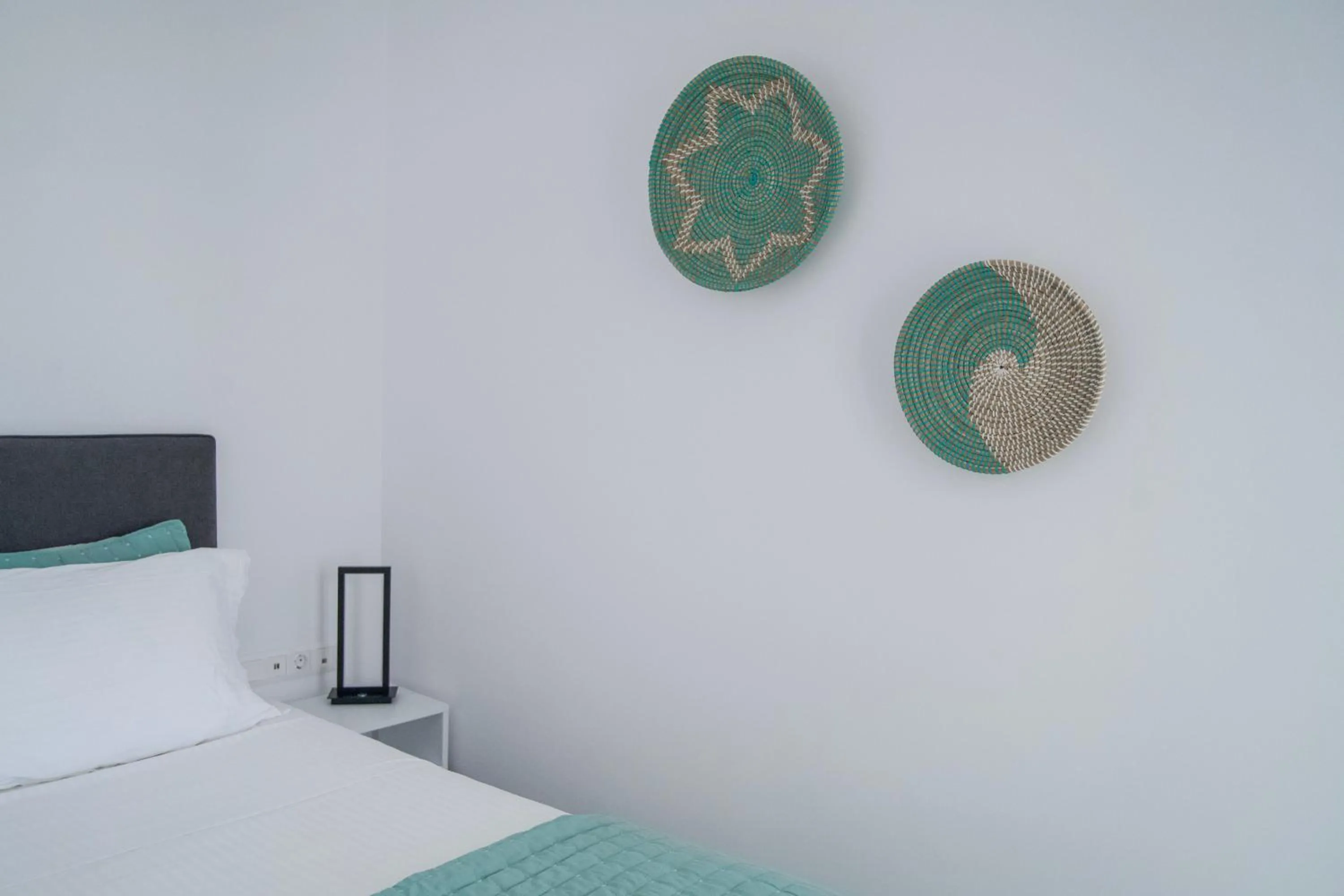 Bed in Alexandros Apartments