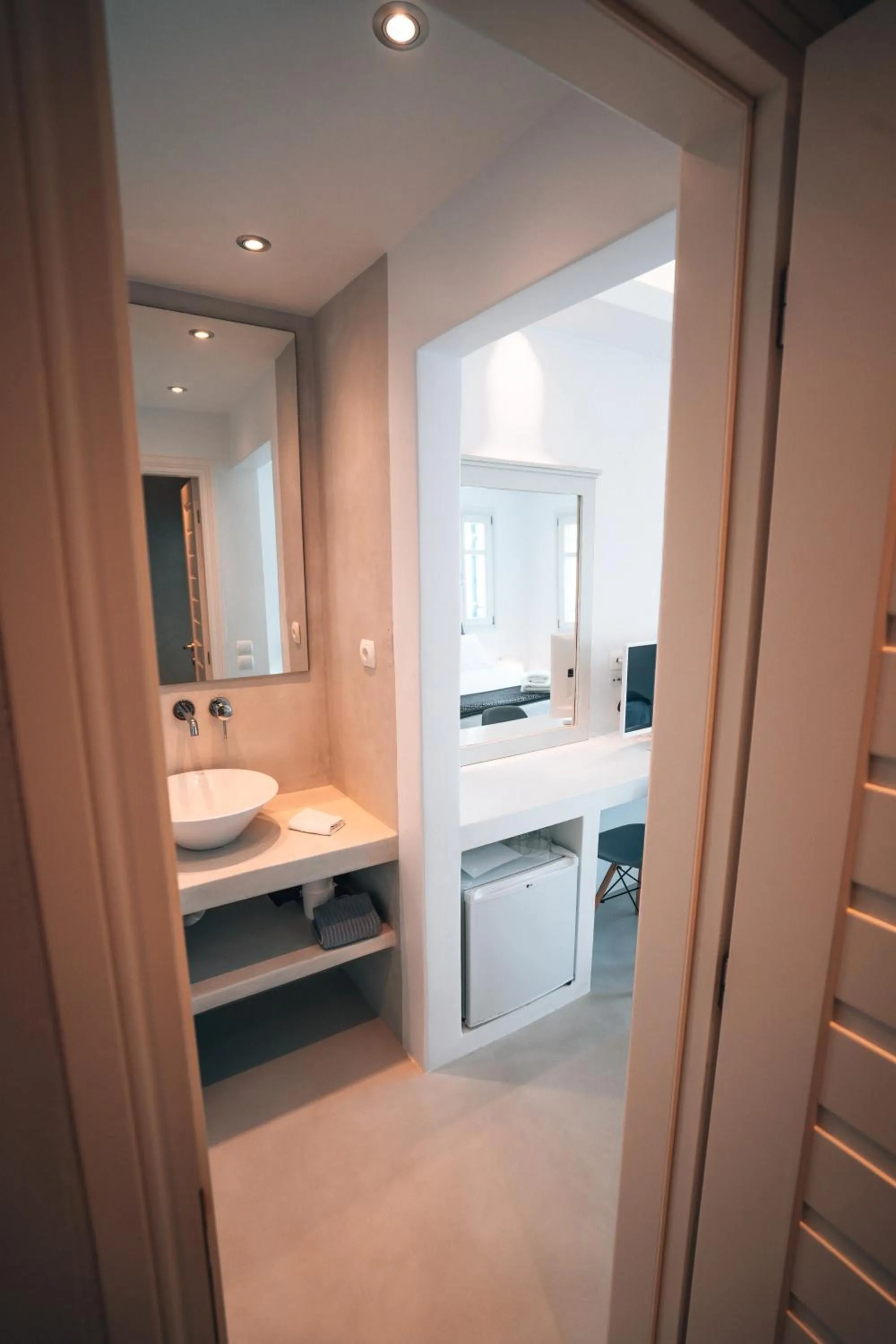 Bed in Alexandros Apartments