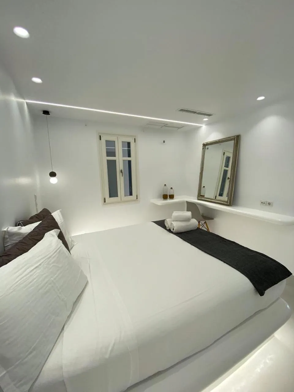 Bed in Alexandros Apartments
