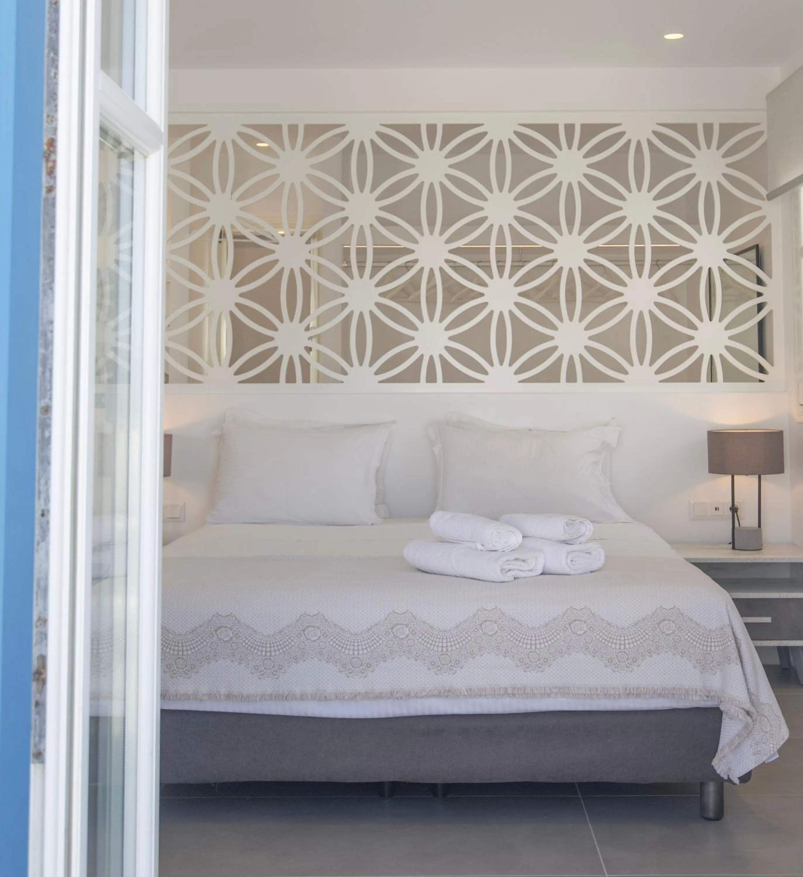 Bed in Alexandros Apartments