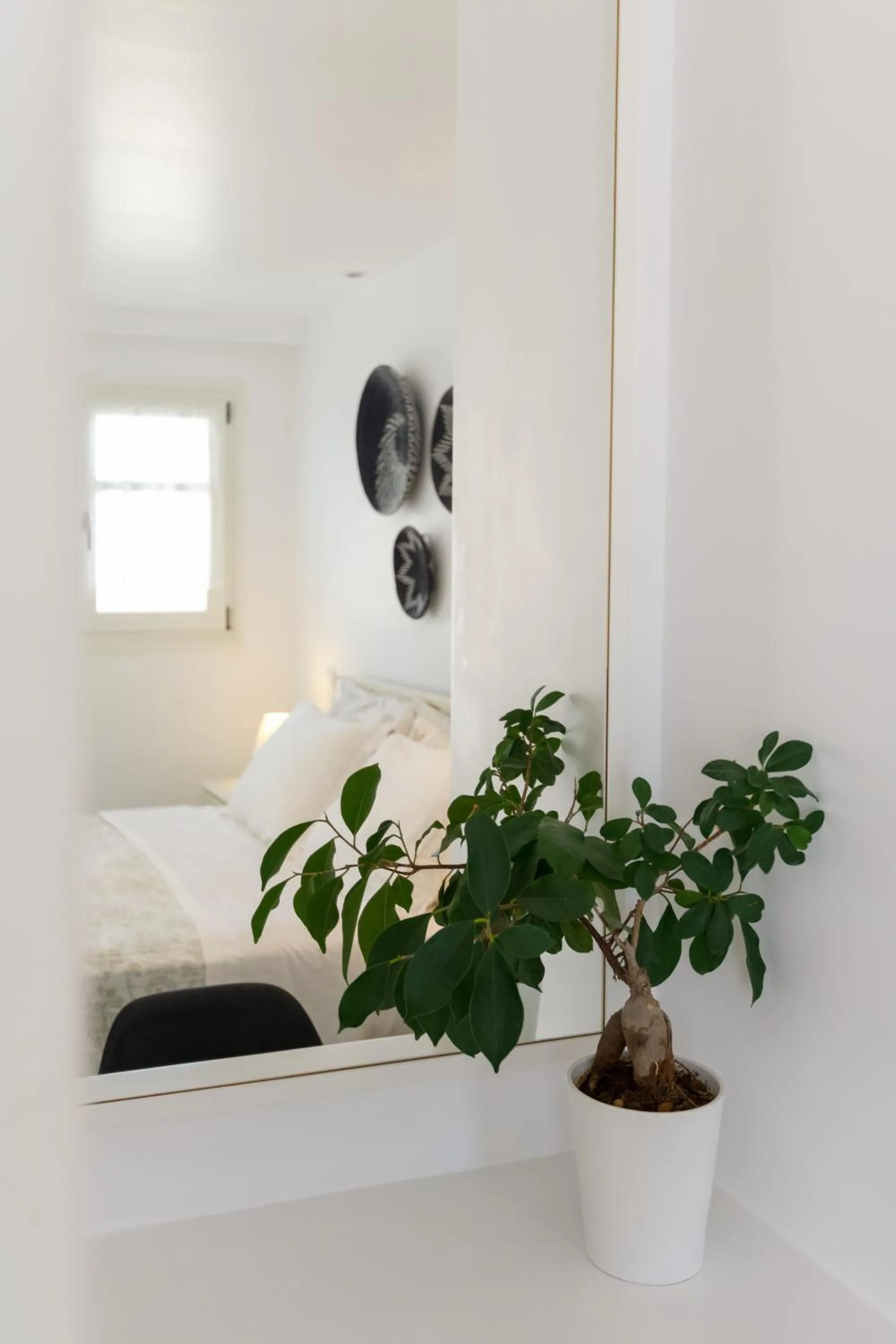 Bed in Alexandros Apartments