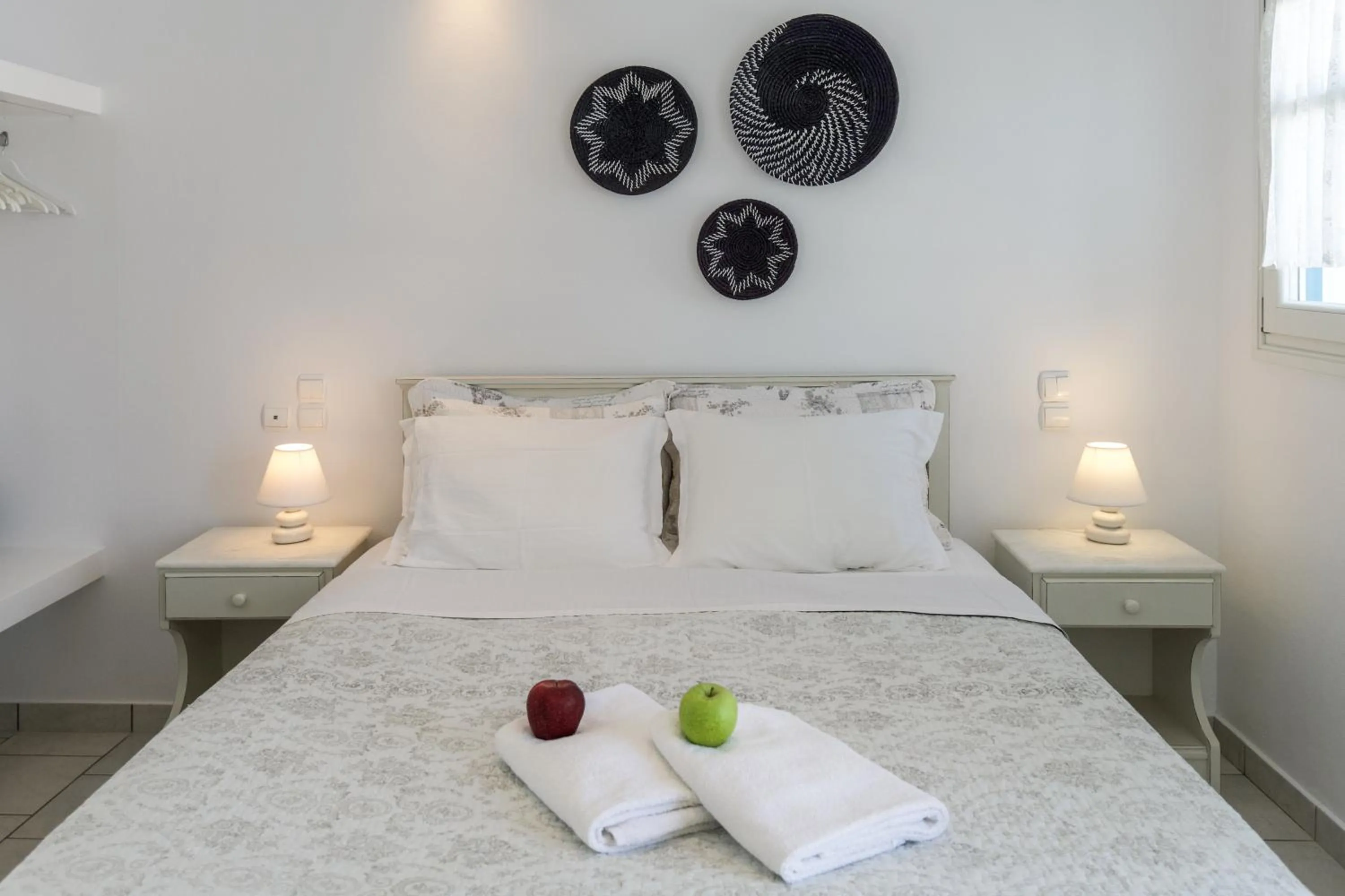 Bed in Alexandros Apartments