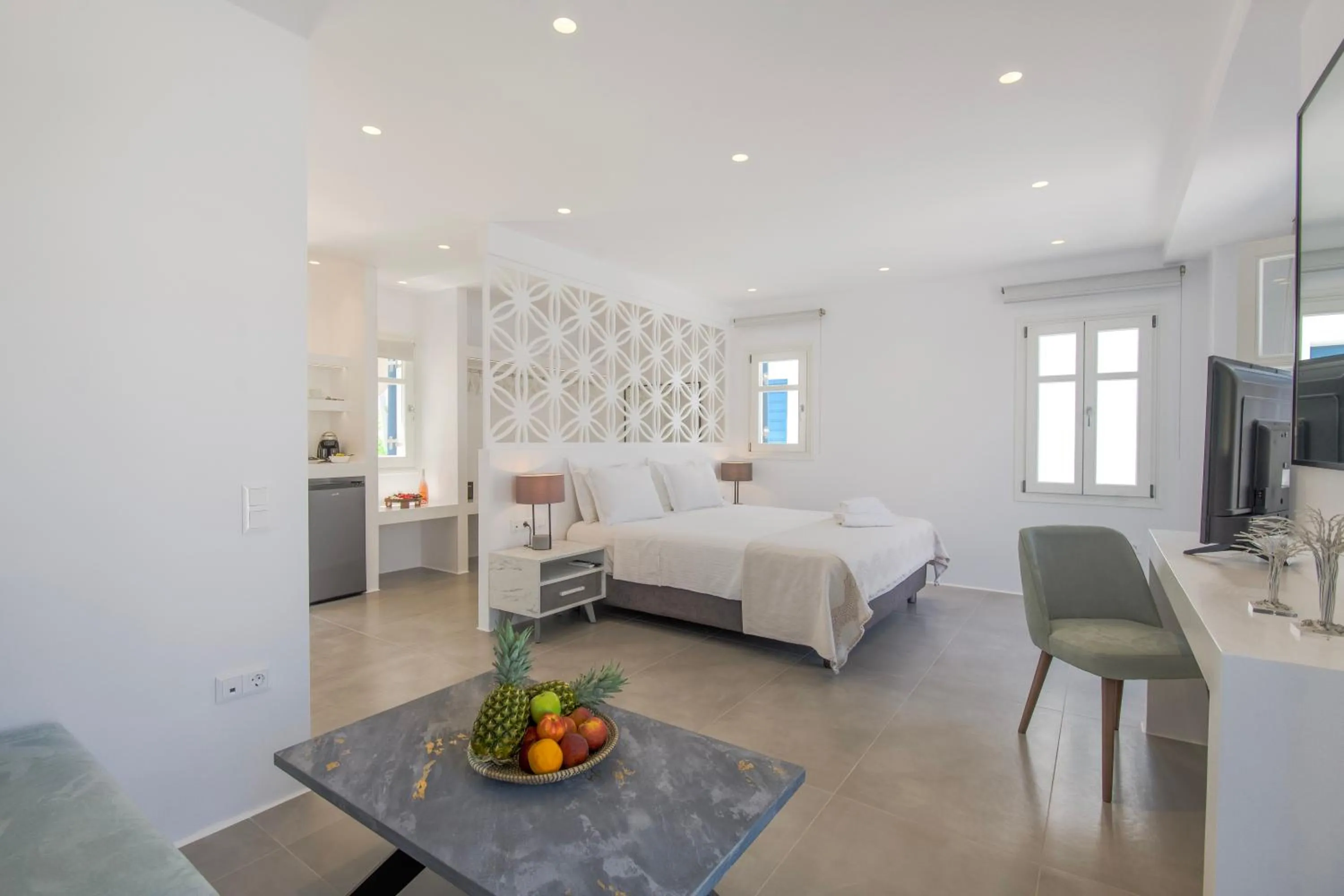 Bed in Alexandros Apartments