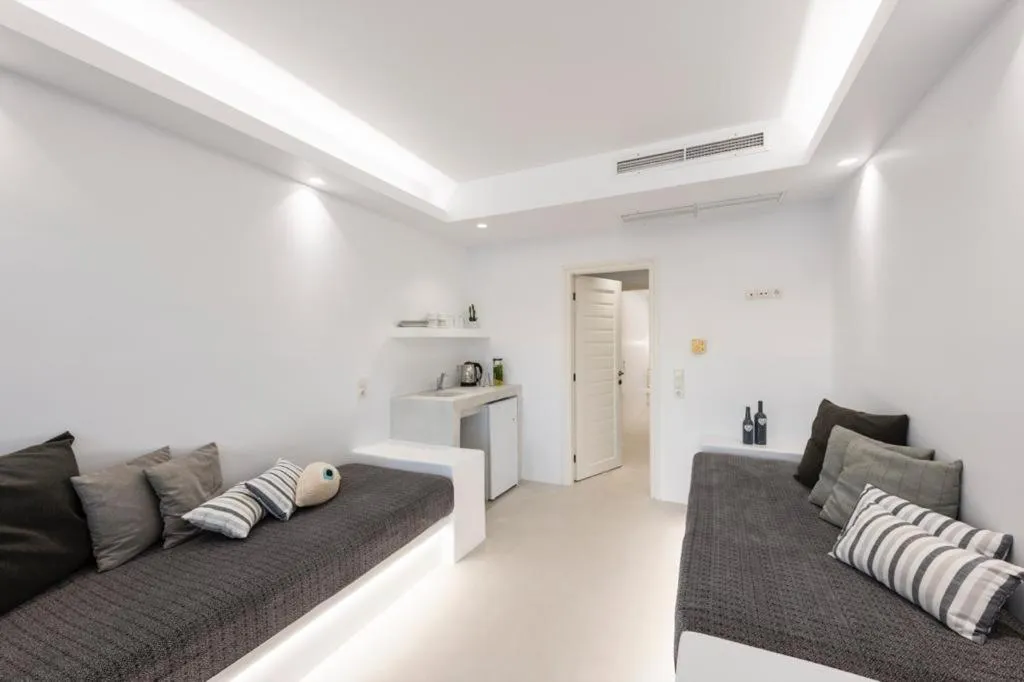 Bed in Alexandros Apartments