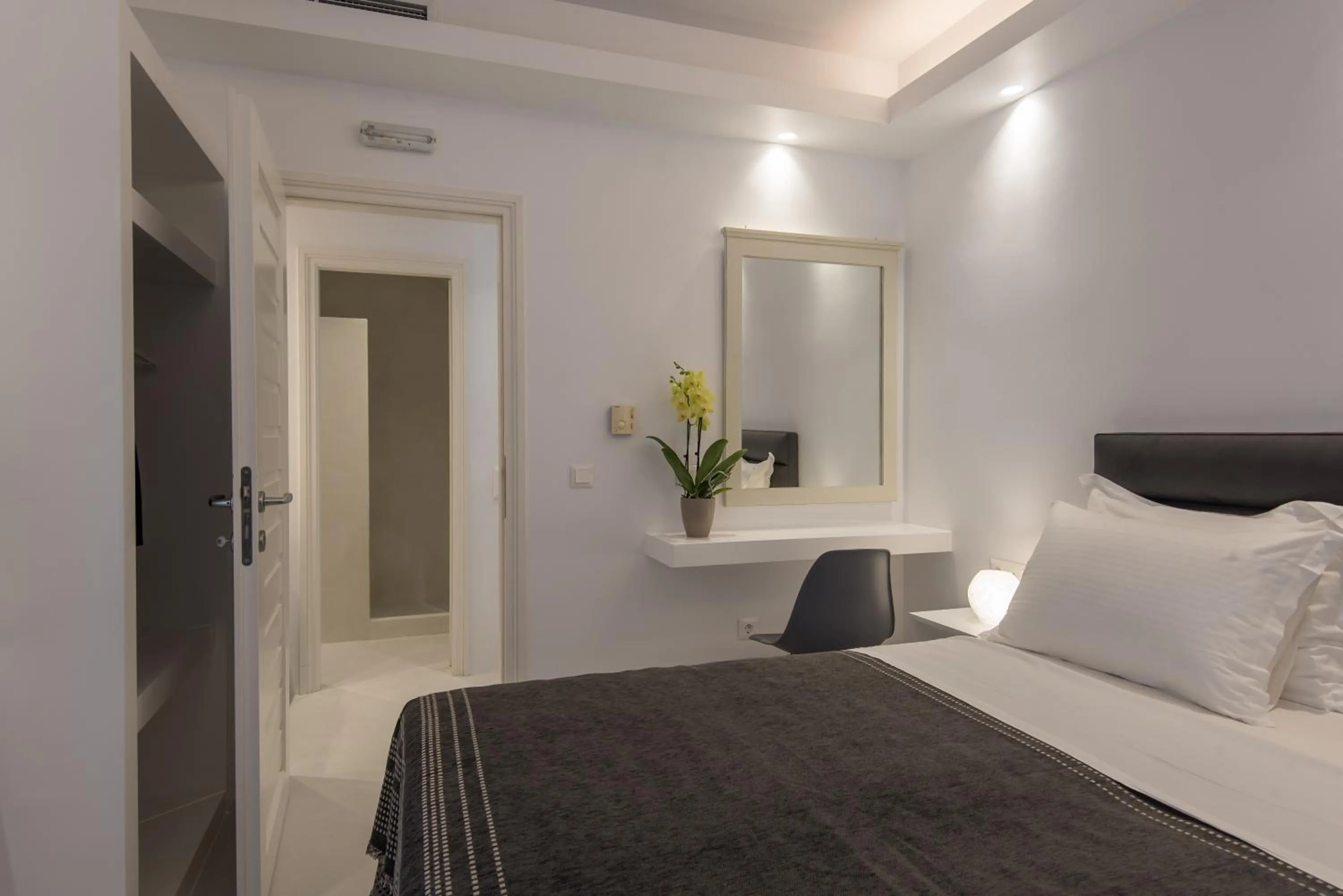 Bed in Alexandros Apartments