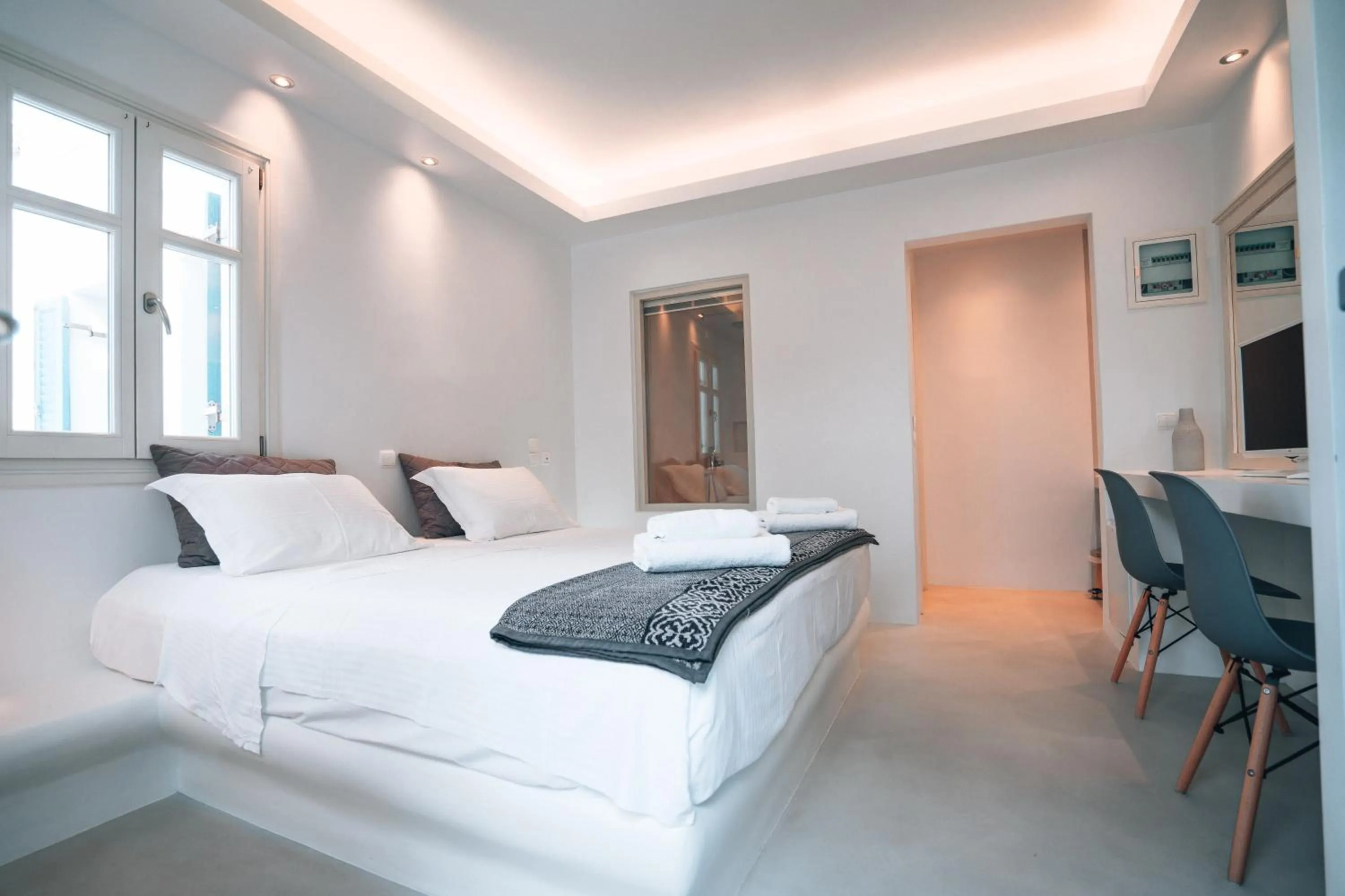 Bed in Alexandros Apartments