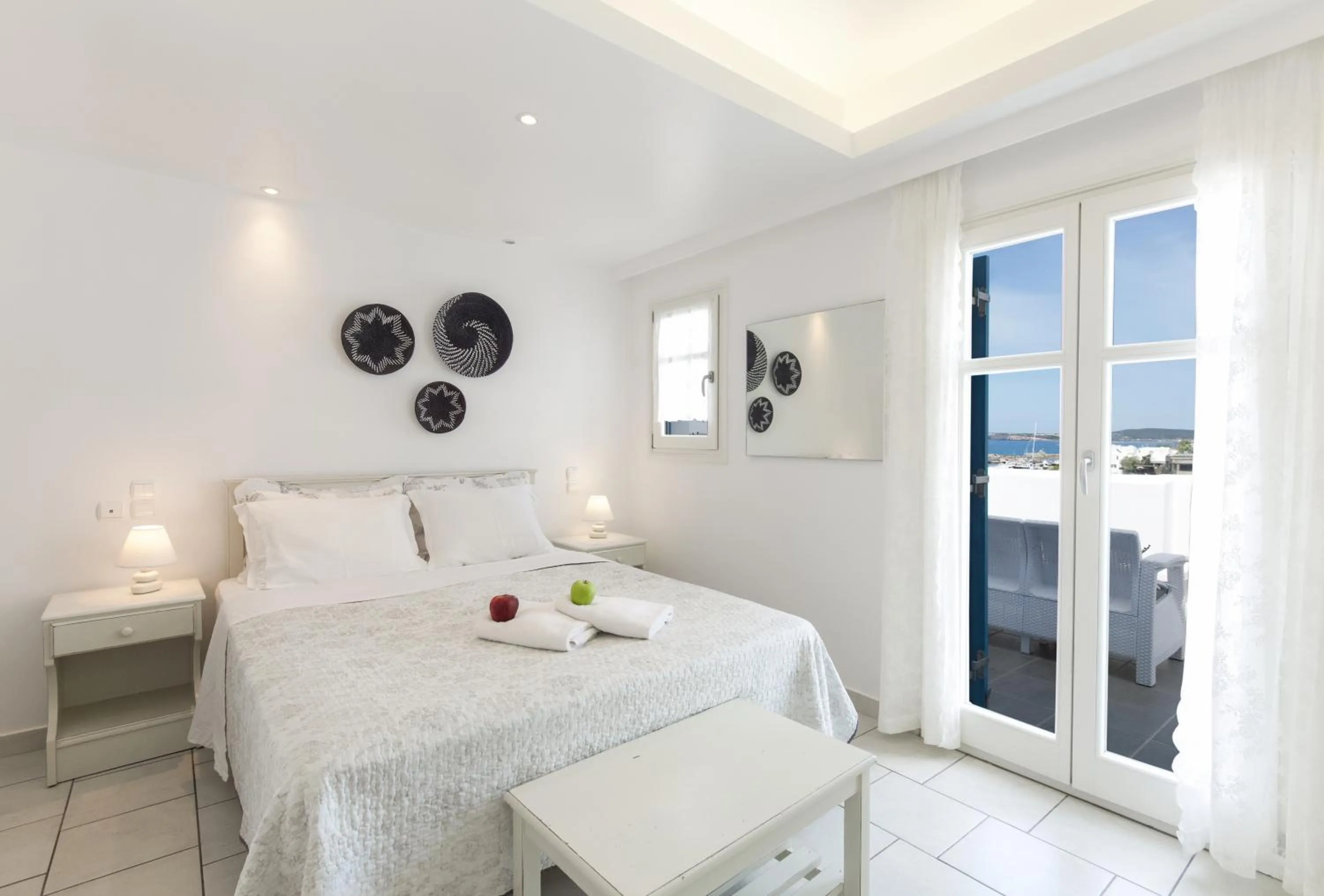 Bed in Alexandros Apartments