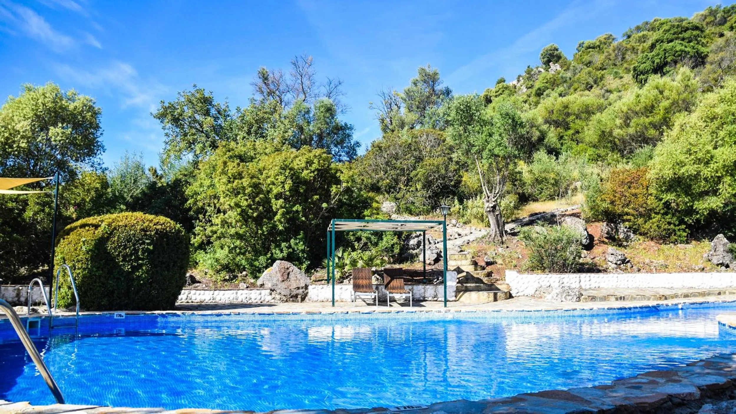 Swimming pool in Casas Rurales Los Algarrobales