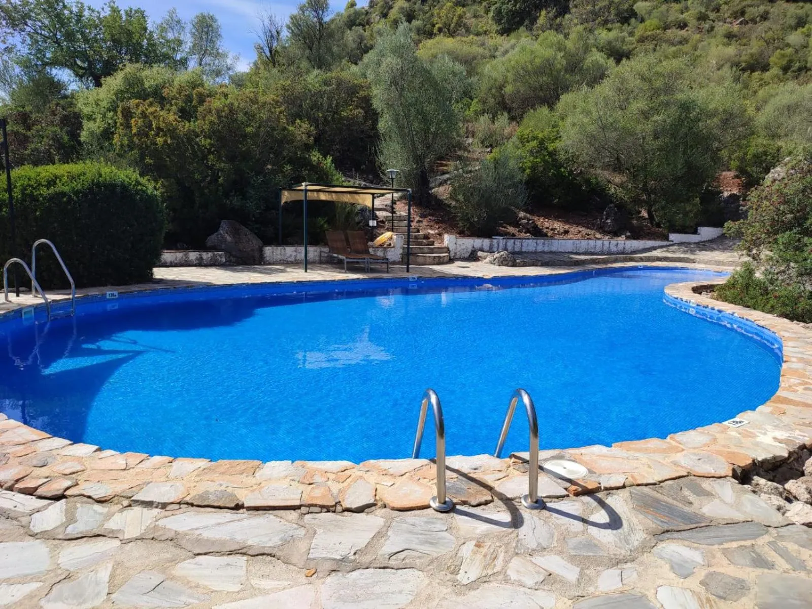 Swimming pool in Casas Rurales Los Algarrobales