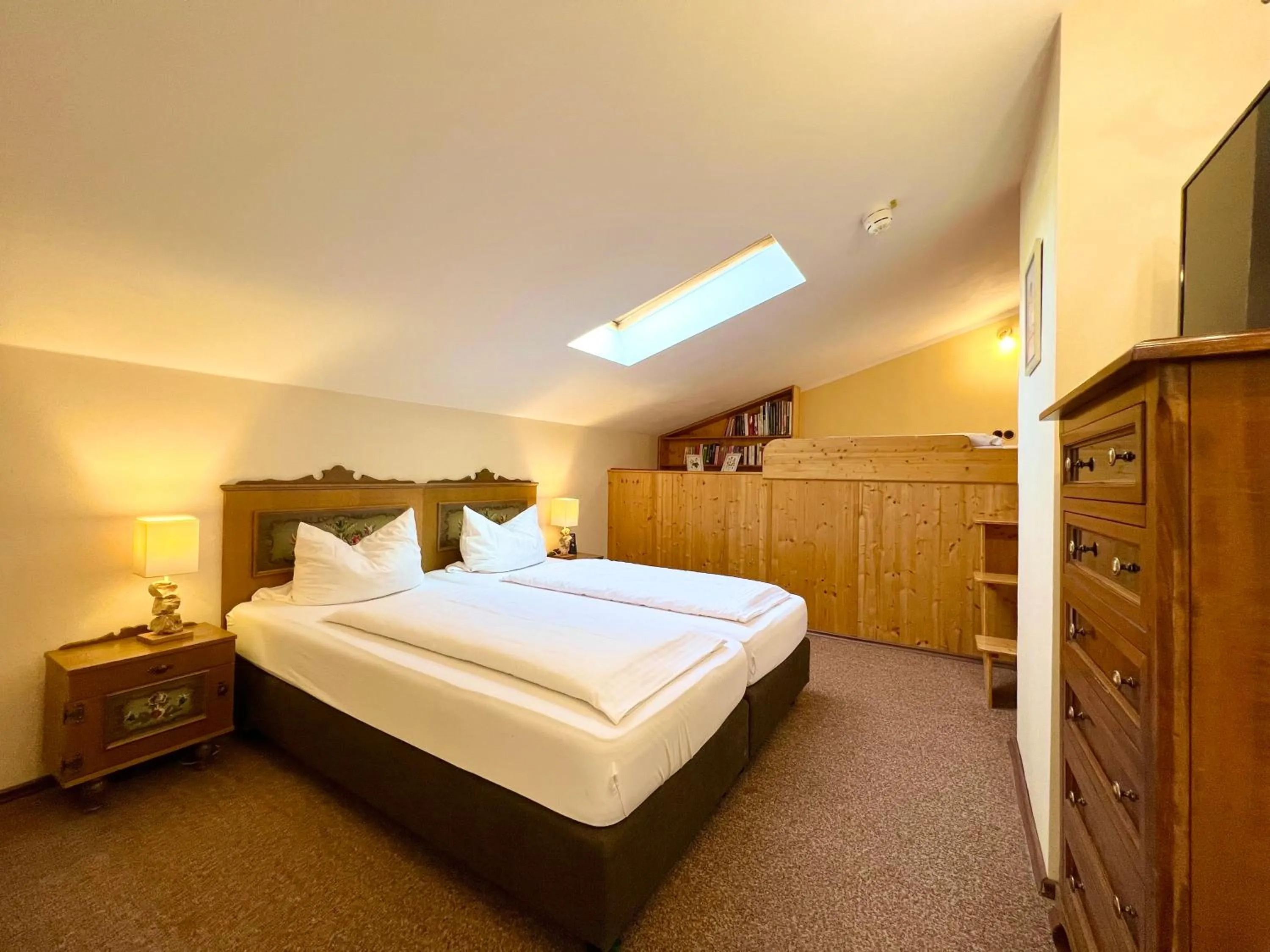 Bed in Hotel Bärenstüberl