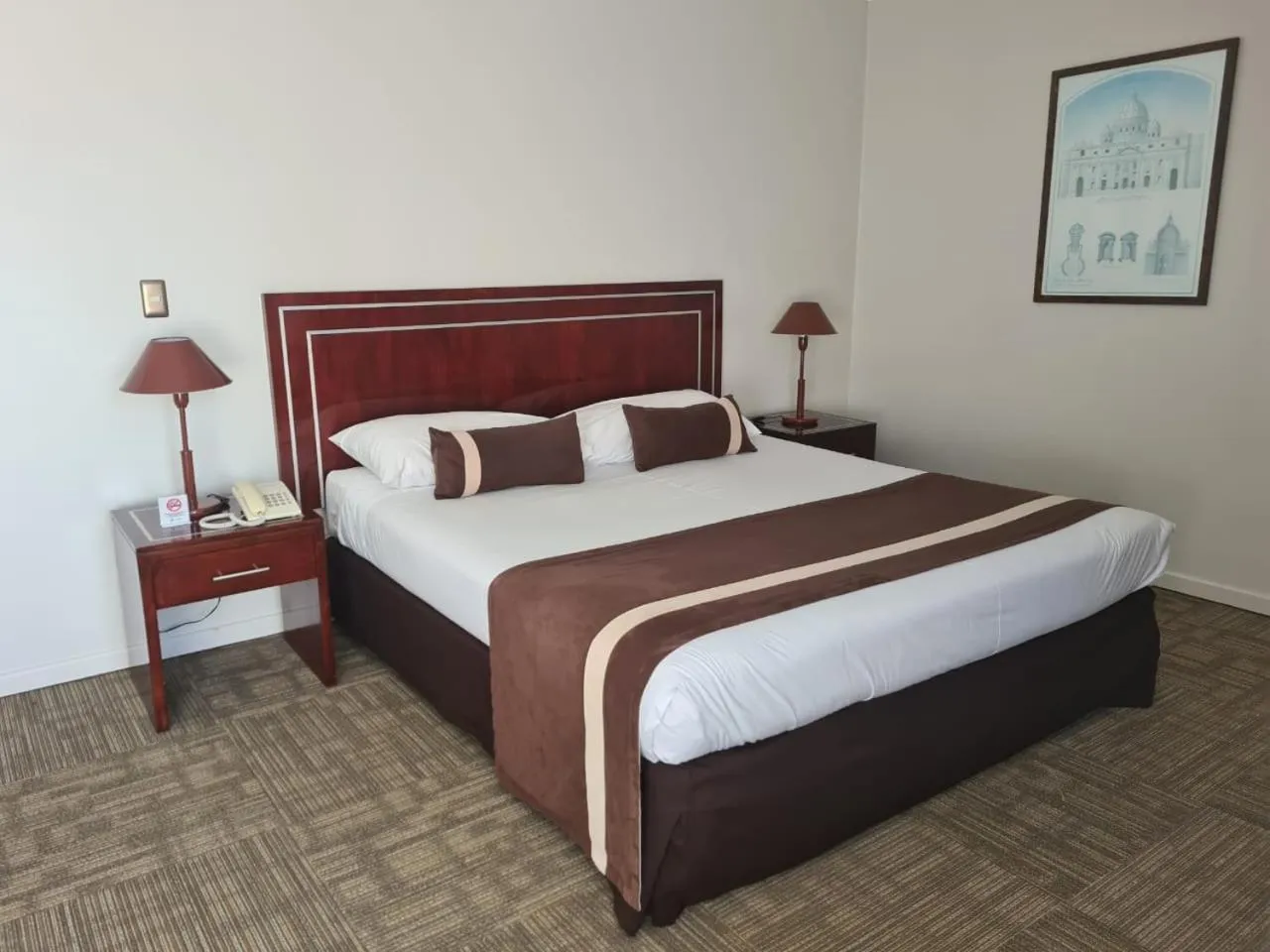 Bed in Hotel Leonardo da Vinci