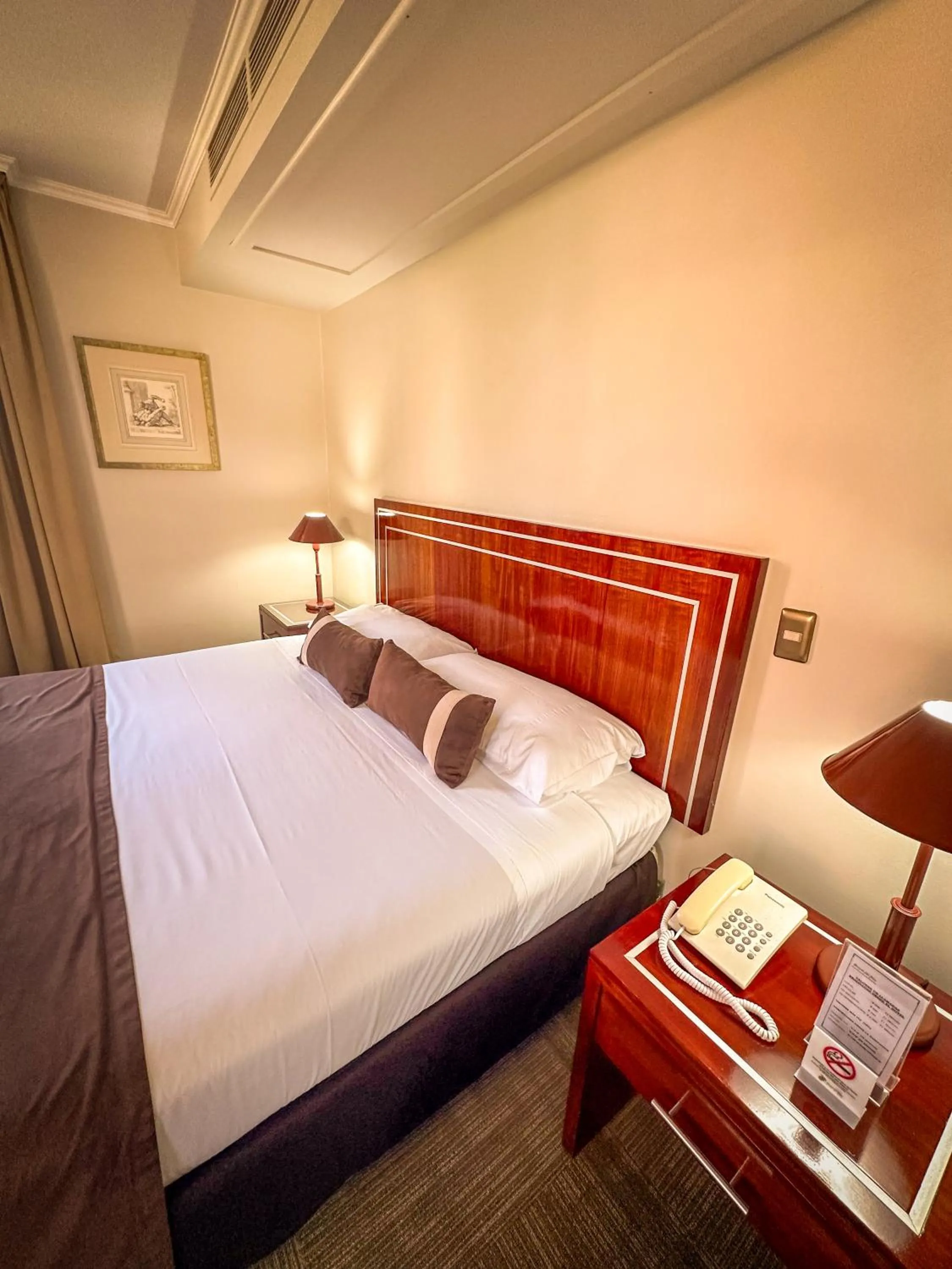 Bed in Hotel Leonardo da Vinci