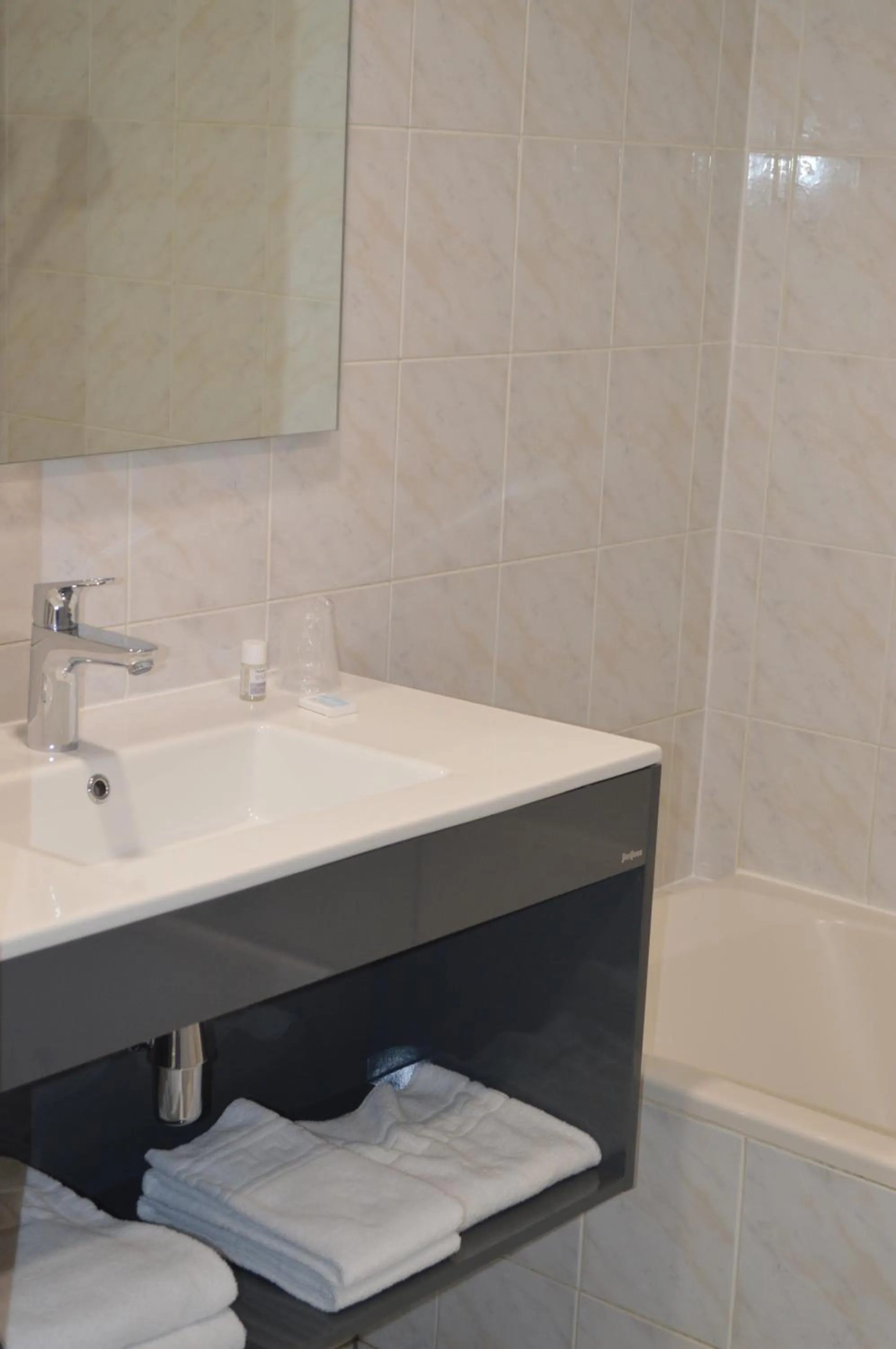 Property building in Logis Hotel du Parc-Restaurant - Le Rouget de Lisle