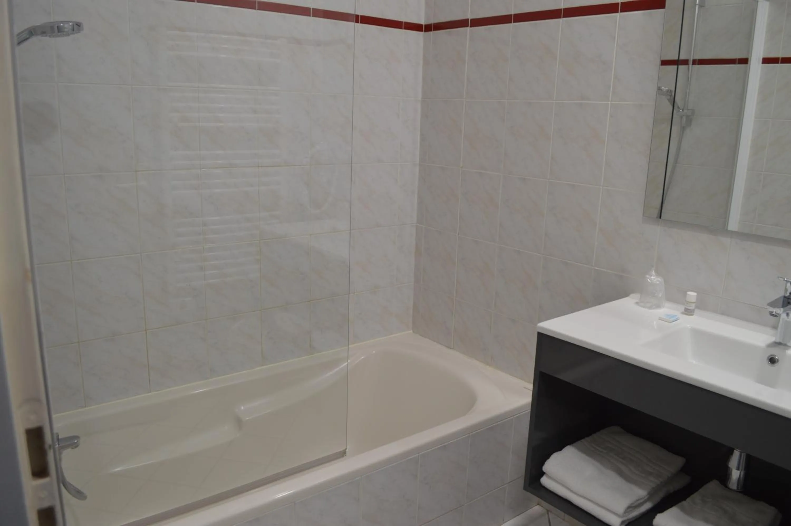 Property building in Logis Hotel du Parc-Restaurant - Le Rouget de Lisle